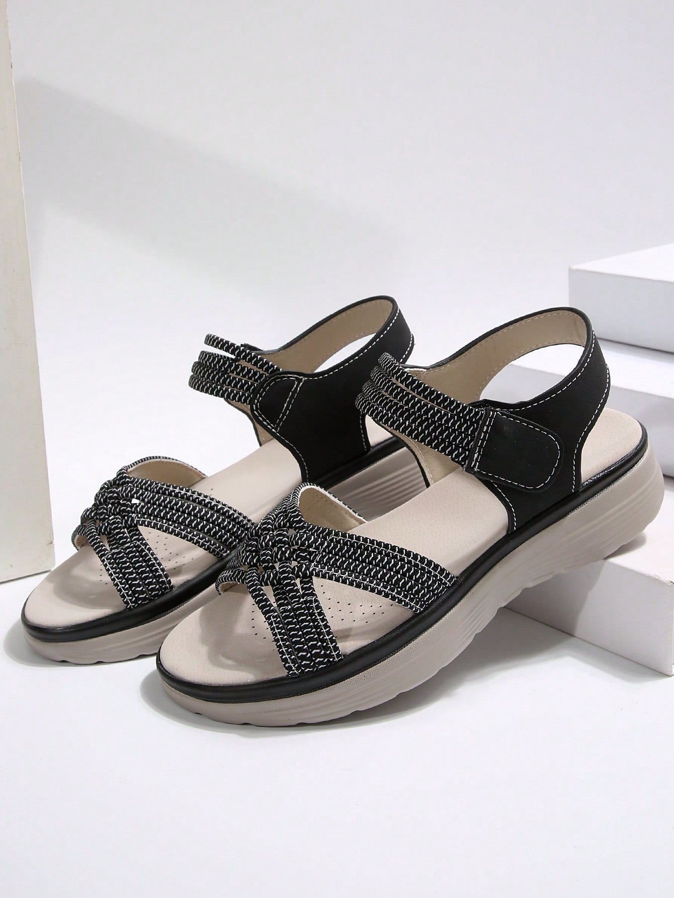Women's plus size platform wedge sandals with hook-and-loop closure, open toe, ankle strap, and cut-out detailing in a casual beach style.