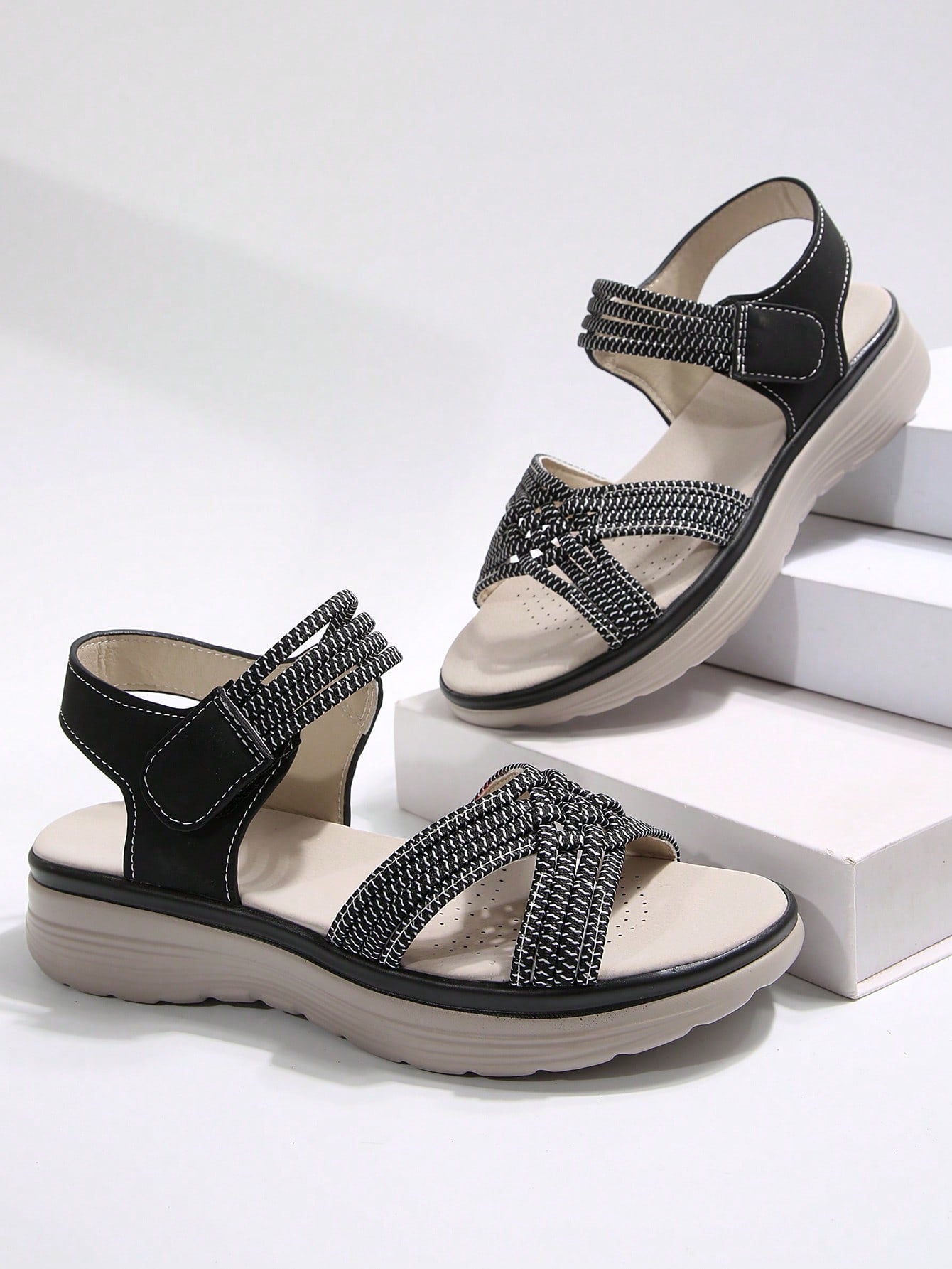 Women's plus size platform wedge sandals with hook-and-loop closure, open toe, ankle strap, and cut-out detailing in a casual beach style.