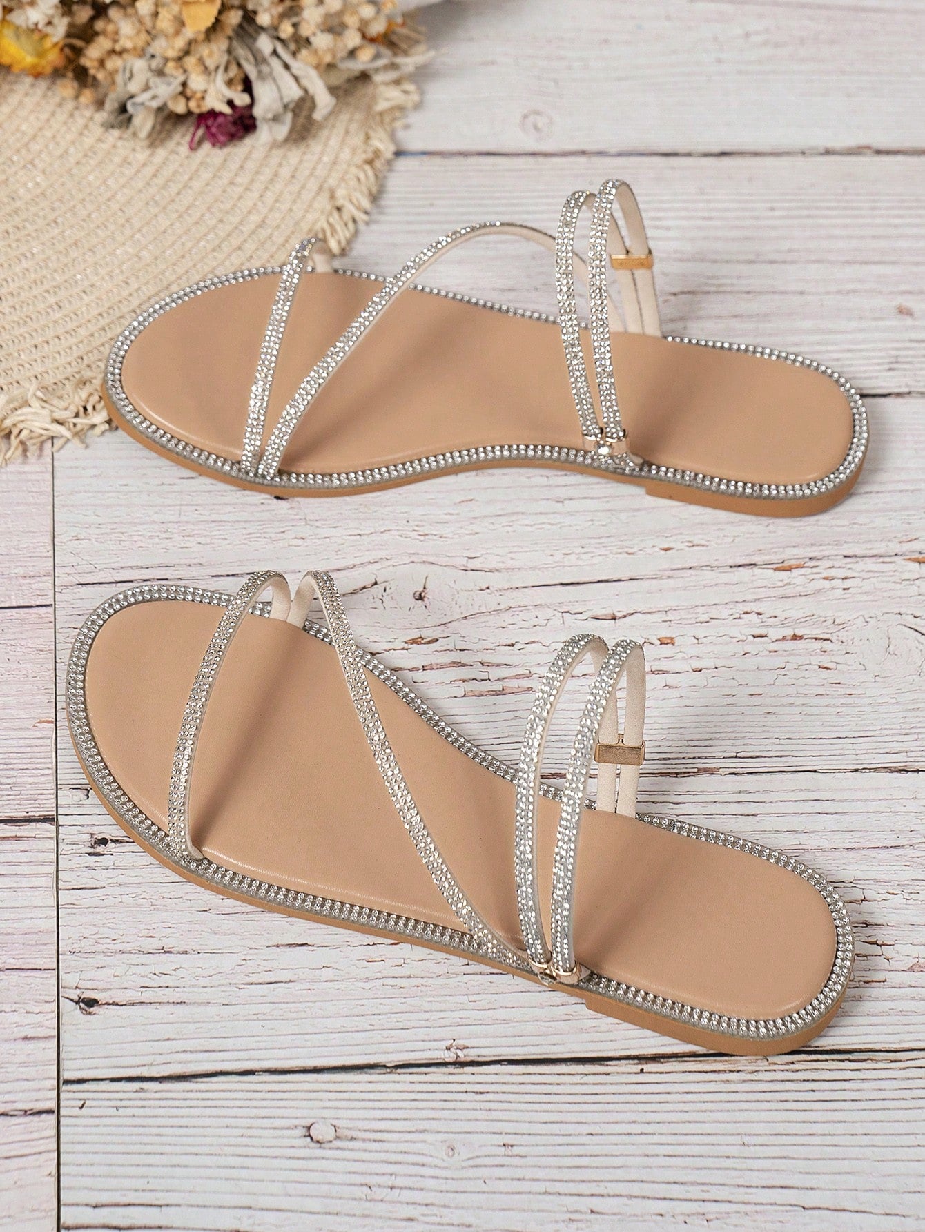 Women's flat open-toe sandals featuring braided multi-strap detailing in a solid color, designed for everyday wear, beach outings, parties, and summer events.