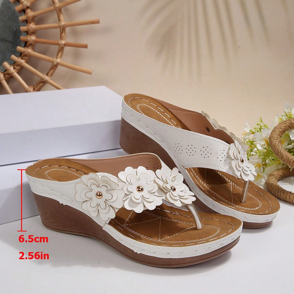 Women's gold platform flip flop wedge sandals with toe post and textured flower detail, slip-on vacation slide style with mid heel.