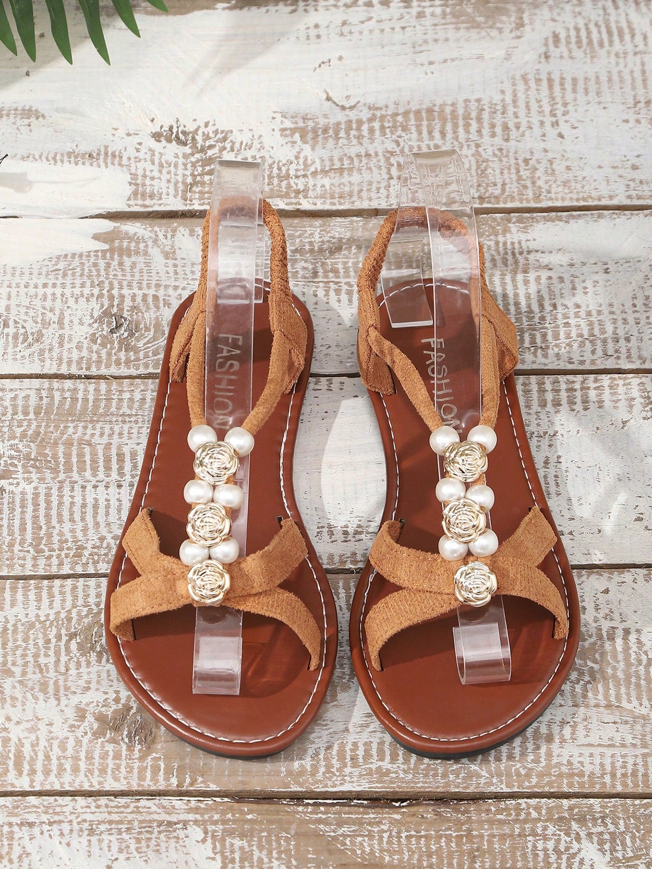Women's beaded open-toe thong flat sandals in slip-on style for outdoor and beach casual wear.