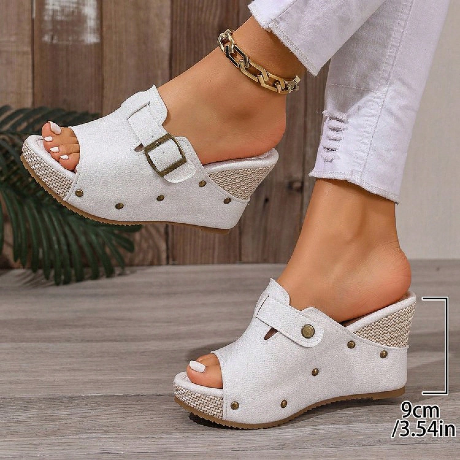 Women's open-toe slip-on platform sandals with a chunky T-strap and buckle detail, mid heel, and PU leather upper.