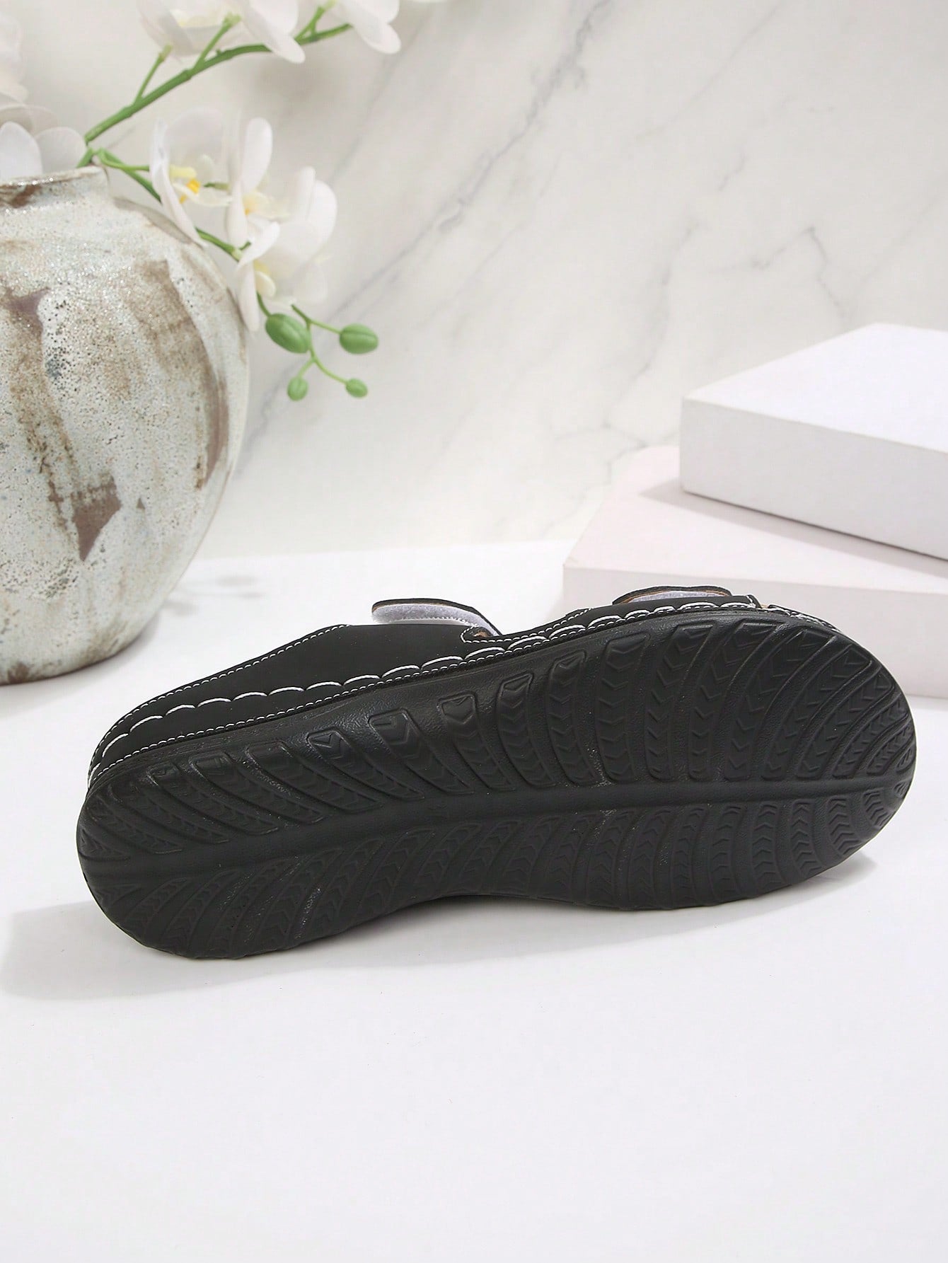 Women's color block platform flat sandals with open toe, criss-cross straps, and hook-loop closure, featuring a low heel thick sole design for casual vacation wear.