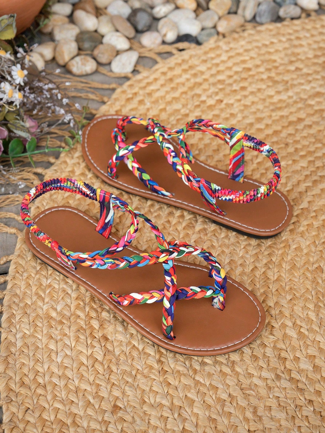 Women’s leopard print woven flat slide sandals with cut-out details and open toe silhouette, casual beach-style slip-on design.