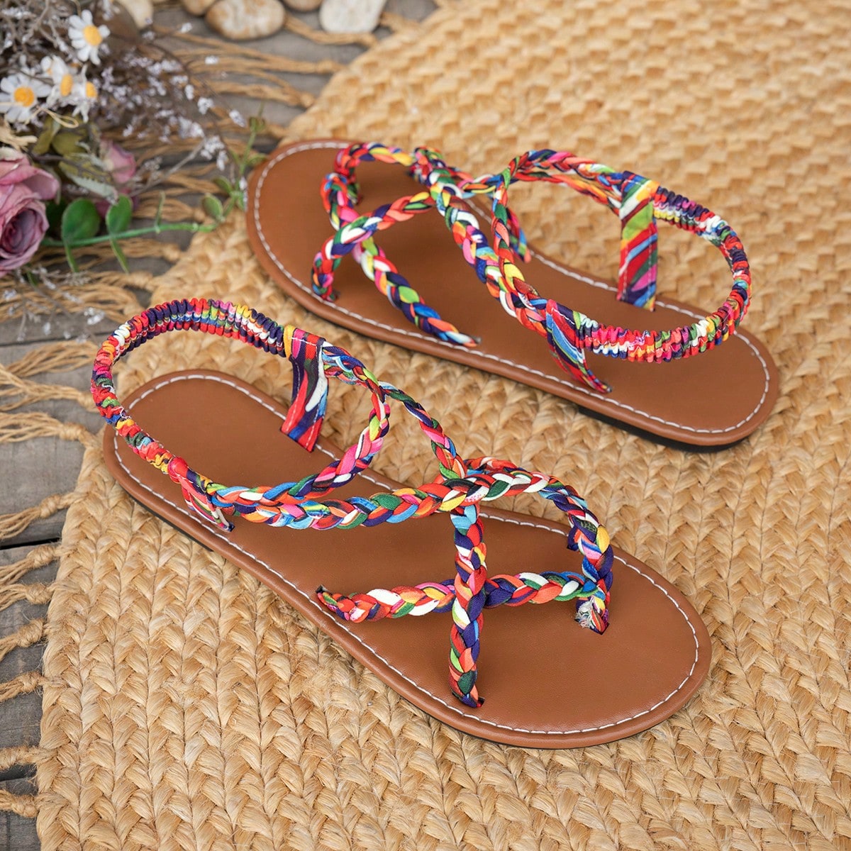 Women’s leopard print woven flat slide sandals with cut-out details and open toe silhouette, casual beach-style slip-on design.