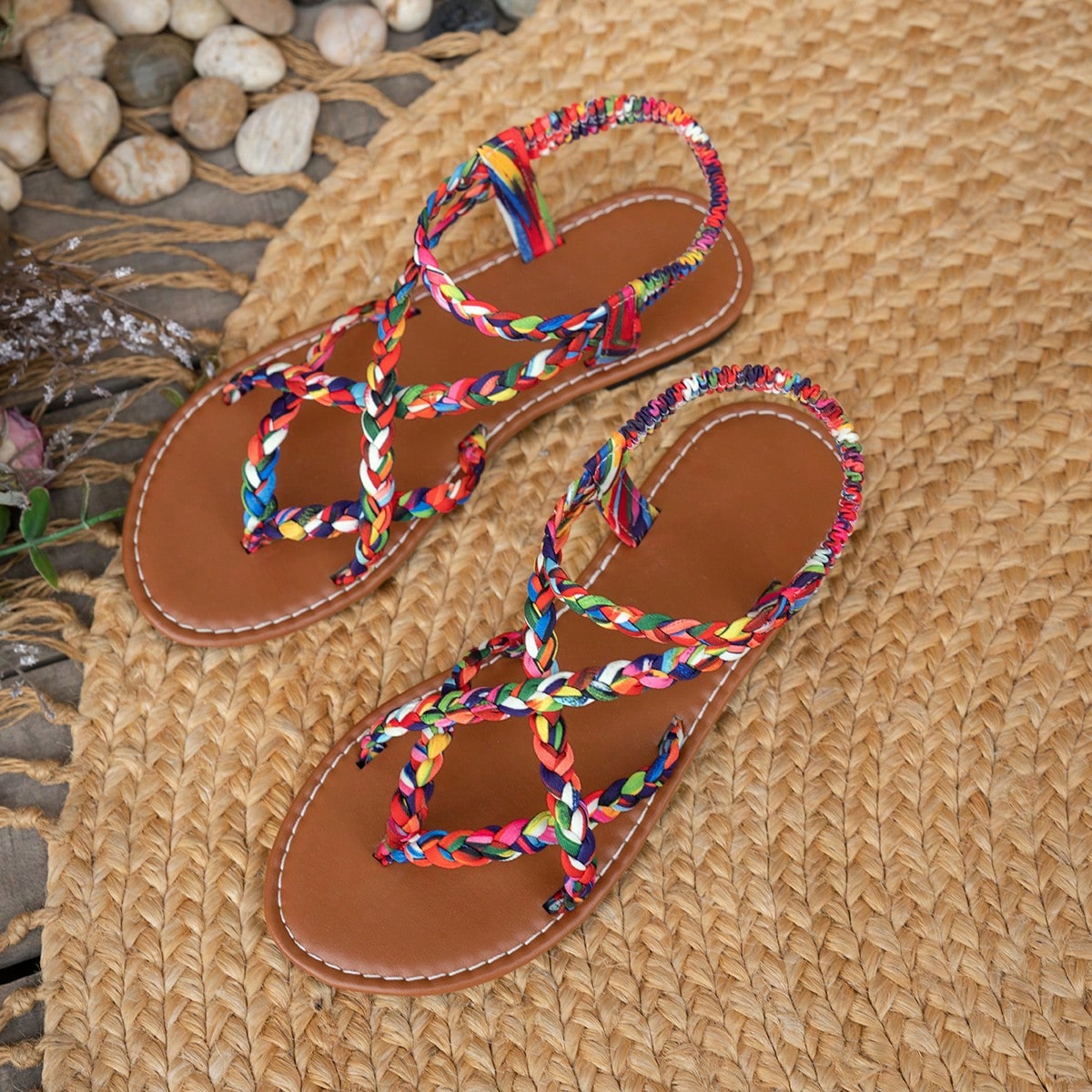 Women’s leopard print woven flat slide sandals with cut-out details and open toe silhouette, casual beach-style slip-on design.