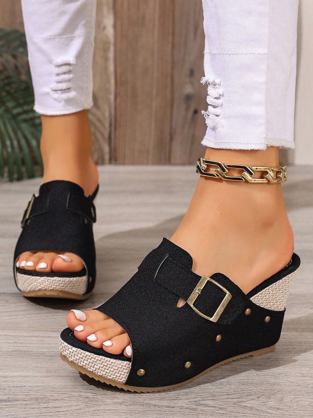 Women's open-toe slip-on platform sandals with a chunky T-strap and buckle detail, mid heel, and PU leather upper.