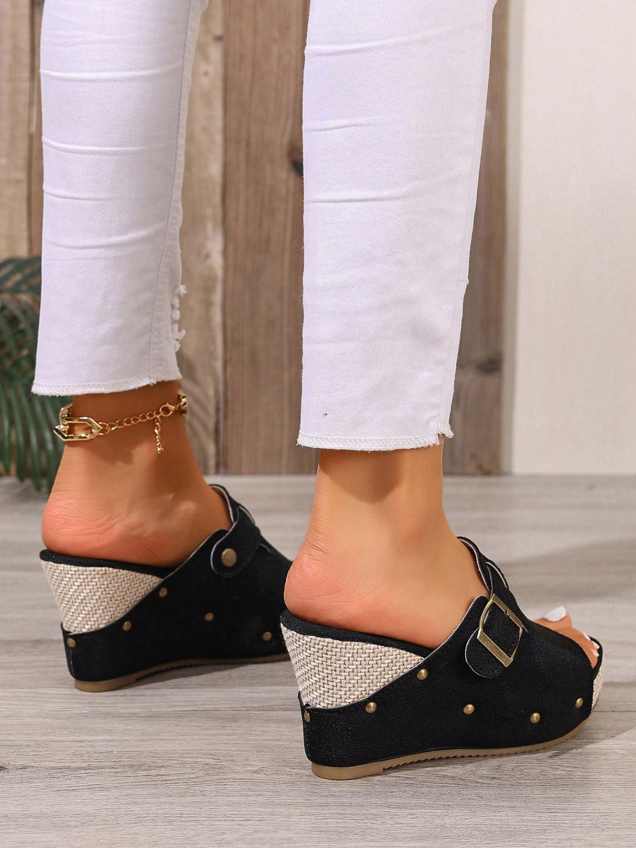 Women's open-toe slip-on platform sandals with a chunky T-strap and buckle detail, mid heel, and PU leather upper.