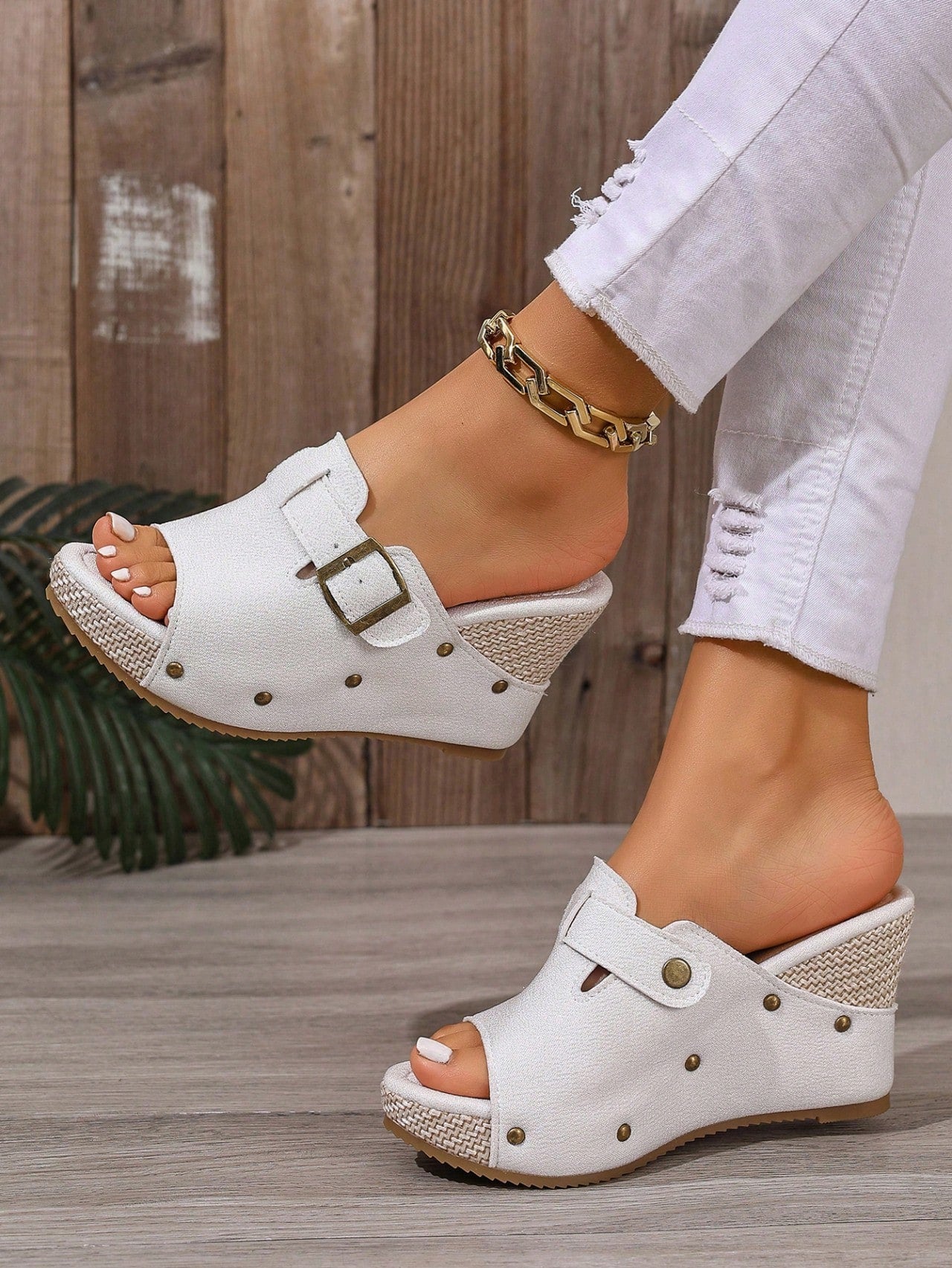 Women's open-toe slip-on platform sandals with a chunky T-strap and buckle detail, mid heel, and PU leather upper.