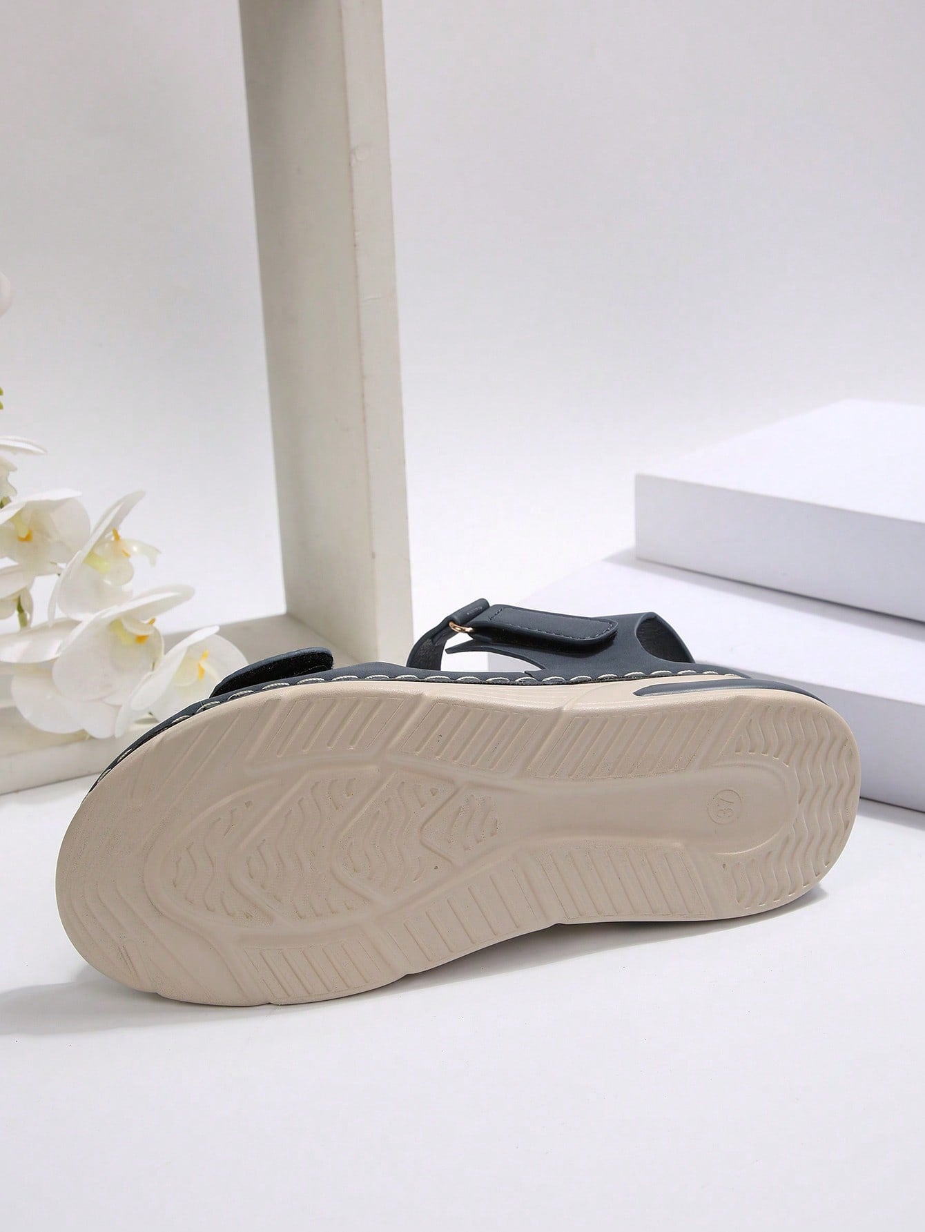 Women's plus size platform wedge sandals with hook-and-loop closure, open toe, ankle strap, and cut-out detailing in a casual beach style.