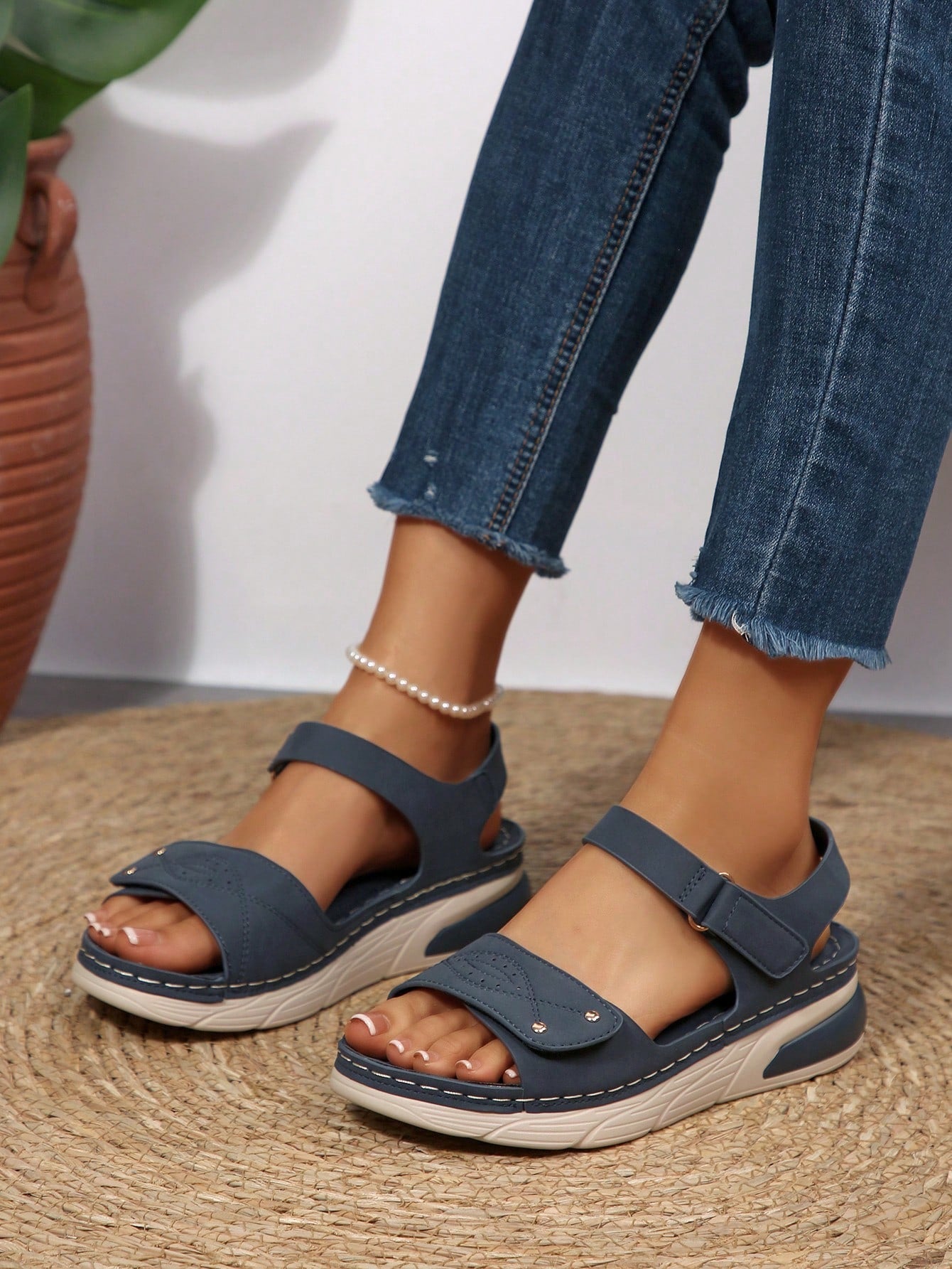 Women's plus size platform wedge sandals with hook-and-loop closure, open toe, ankle strap, and cut-out detailing in a casual beach style.