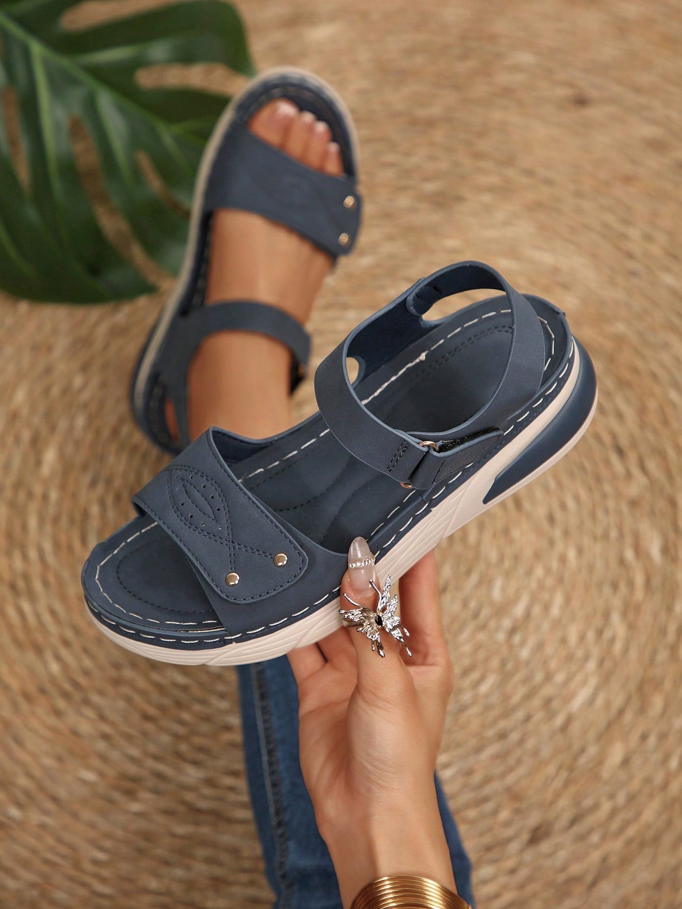 Women's plus size platform wedge sandals with hook-and-loop closure, open toe, ankle strap, and cut-out detailing in a casual beach style.