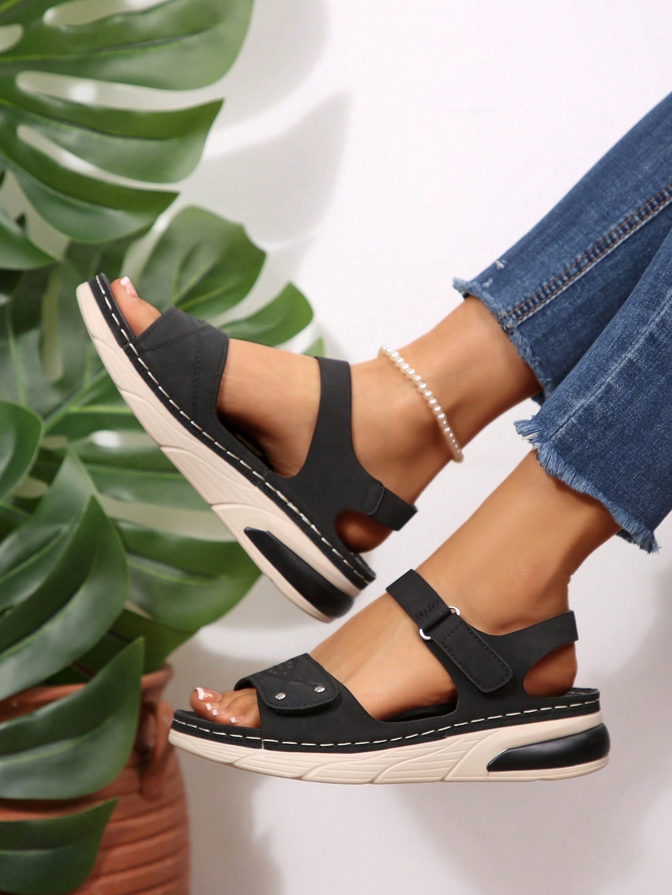 Women's plus size platform wedge sandals with hook-and-loop closure, open toe, ankle strap, and cut-out detailing in a casual beach style.