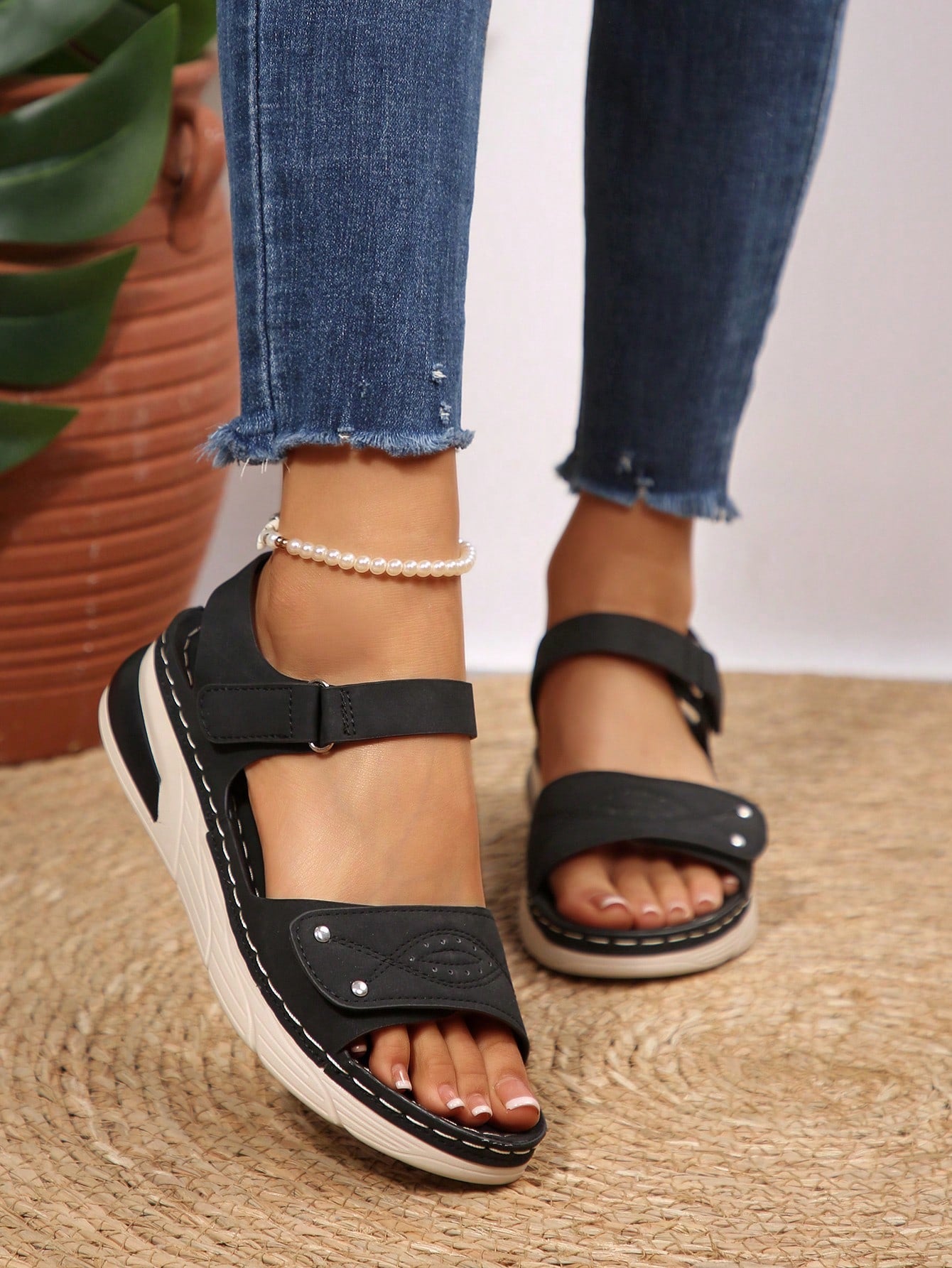 Women's plus size platform wedge sandals with hook-and-loop closure, open toe, ankle strap, and cut-out detailing in a casual beach style.