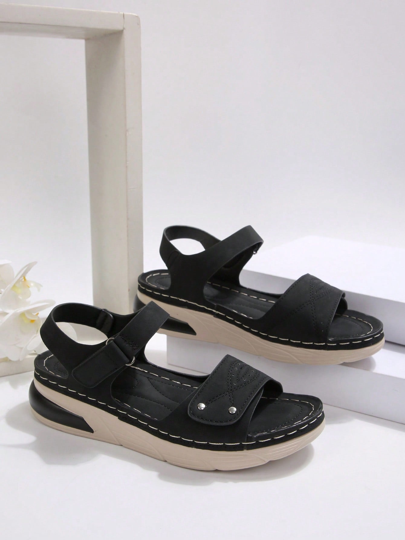 Women's plus size platform wedge sandals with hook-and-loop closure, open toe, ankle strap, and cut-out detailing in a casual beach style.