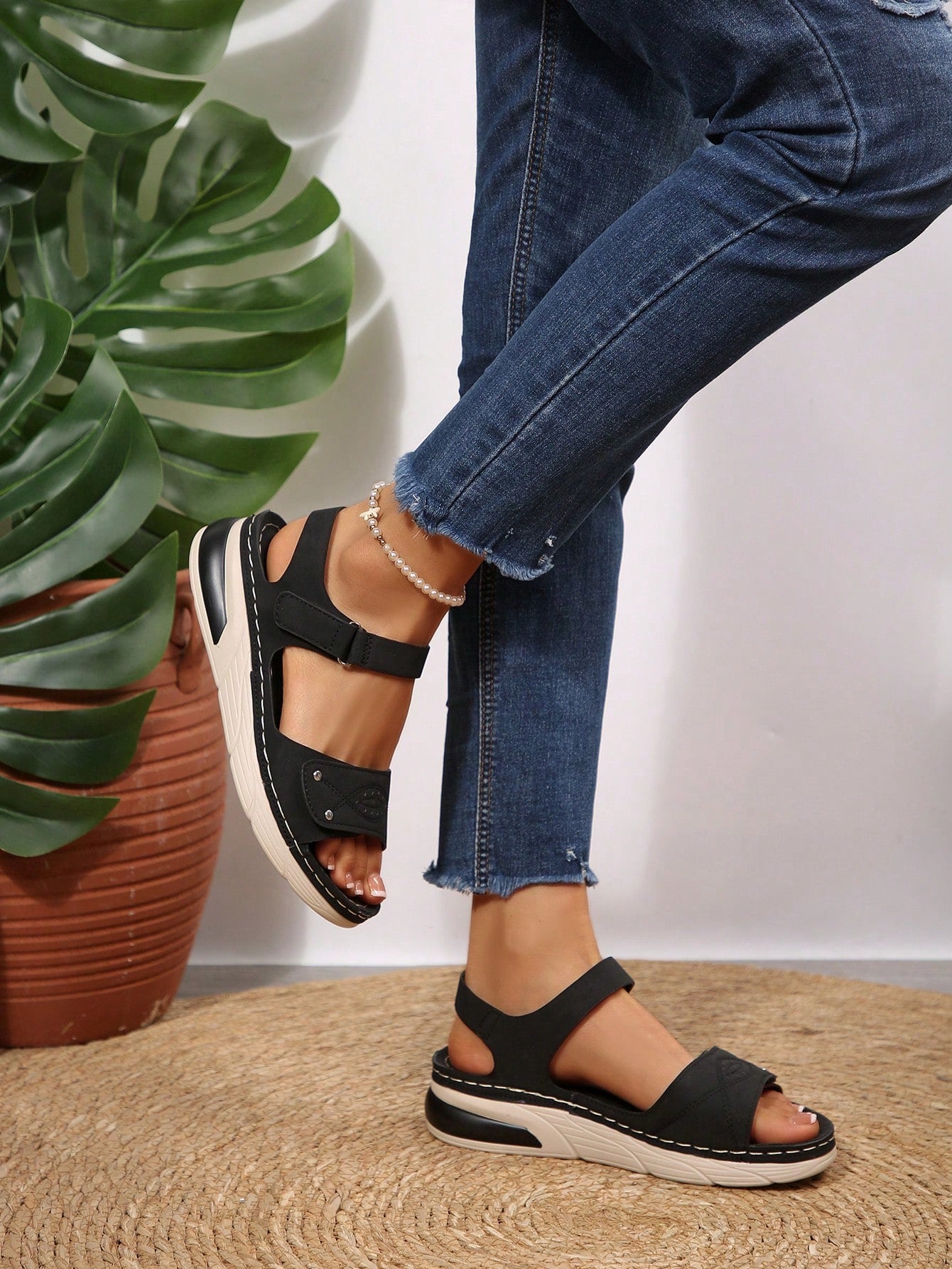 Women's plus size platform wedge sandals with hook-and-loop closure, open toe, ankle strap, and cut-out detailing in a casual beach style.