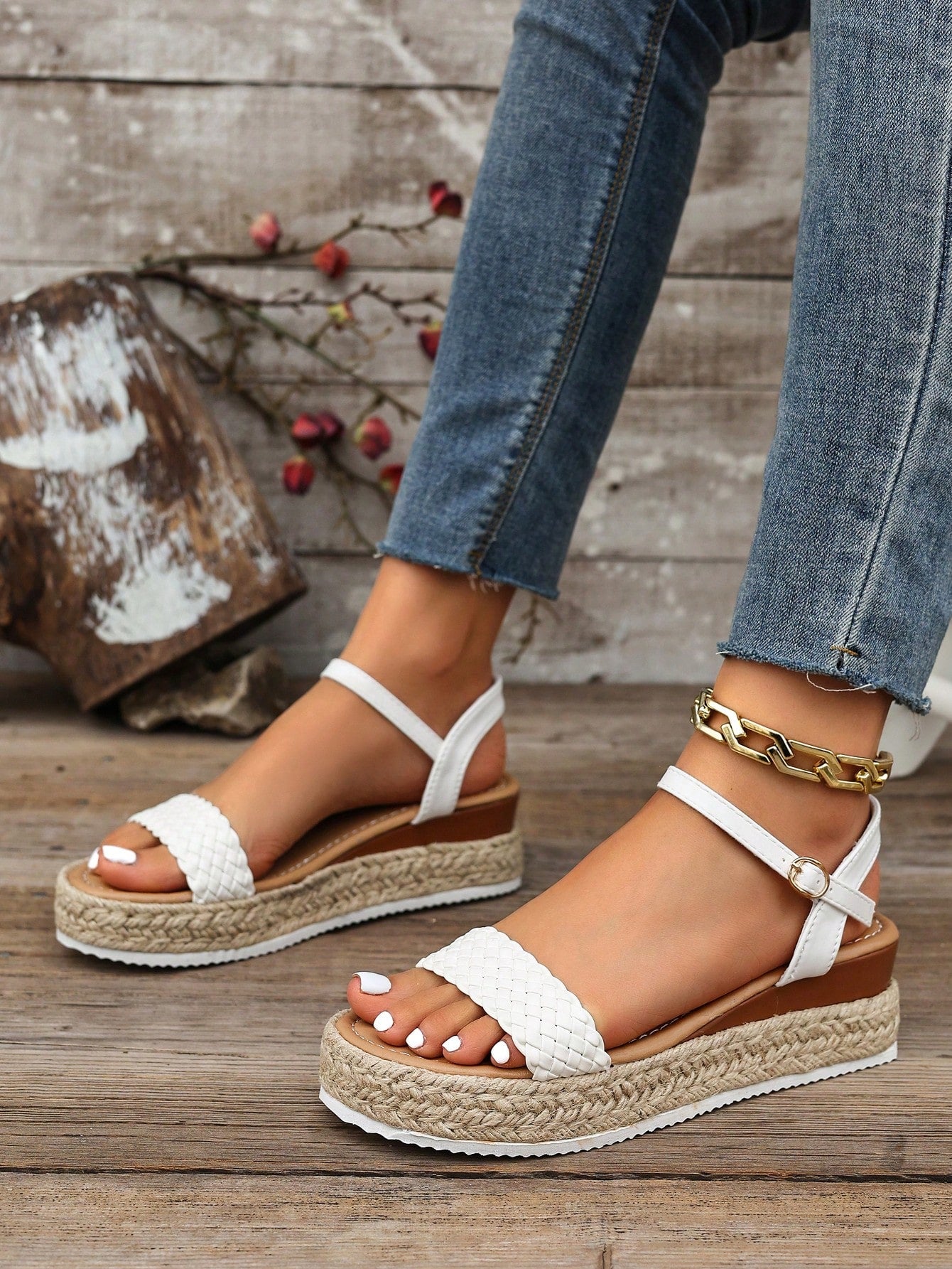 Women's thick sole flip flop sandals with adjustable buckle strap, toe post design, and flatform mid heel in a casual vacation style.