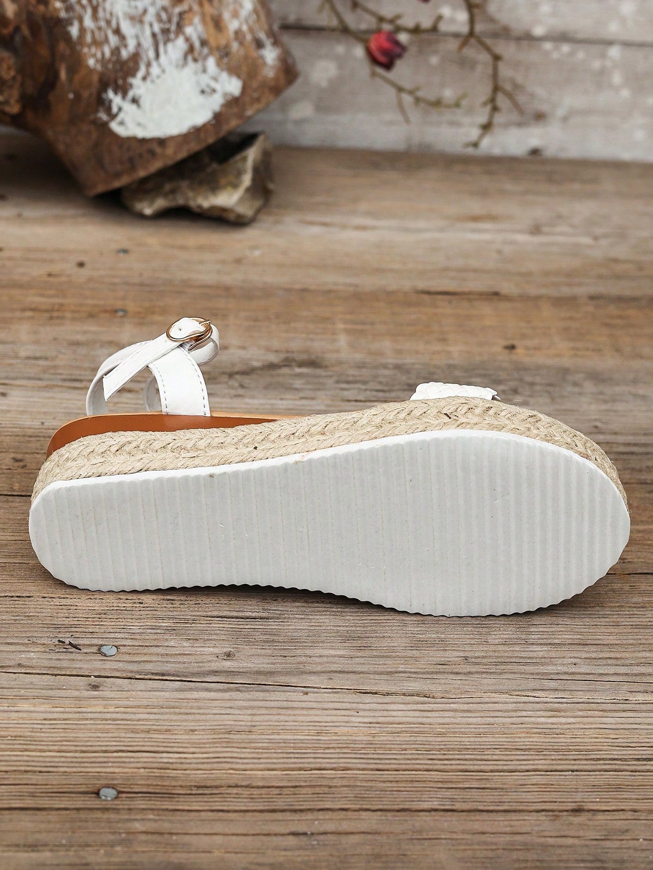Women's thick sole flip flop sandals with adjustable buckle strap, toe post design, and flatform mid heel in a casual vacation style.