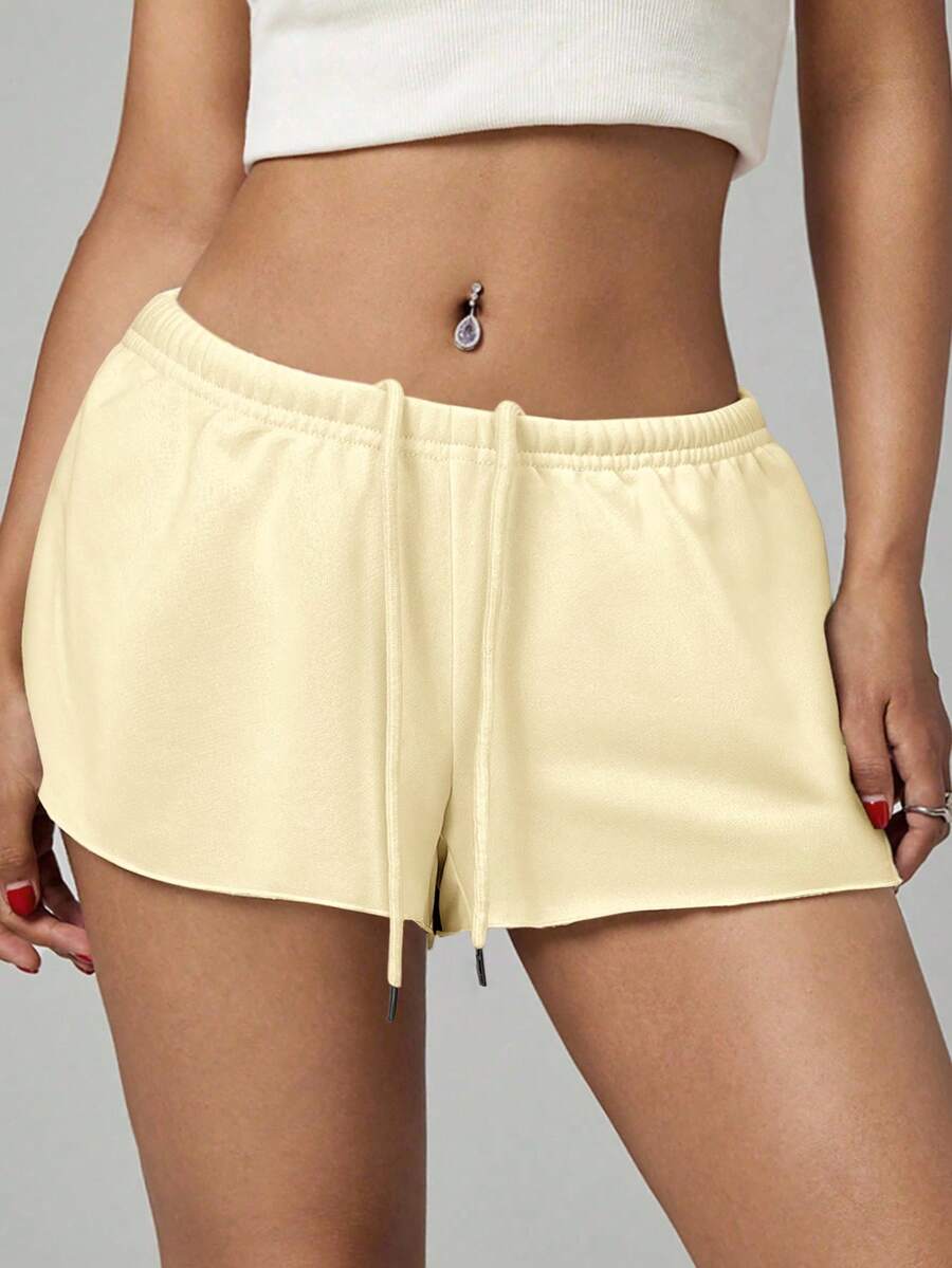Petite women's burgundy casual track shorts with drawstring waist, raw hem, loose fit, and mini length