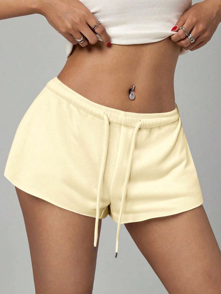 Petite women's burgundy casual track shorts with drawstring waist, raw hem, loose fit, and mini length