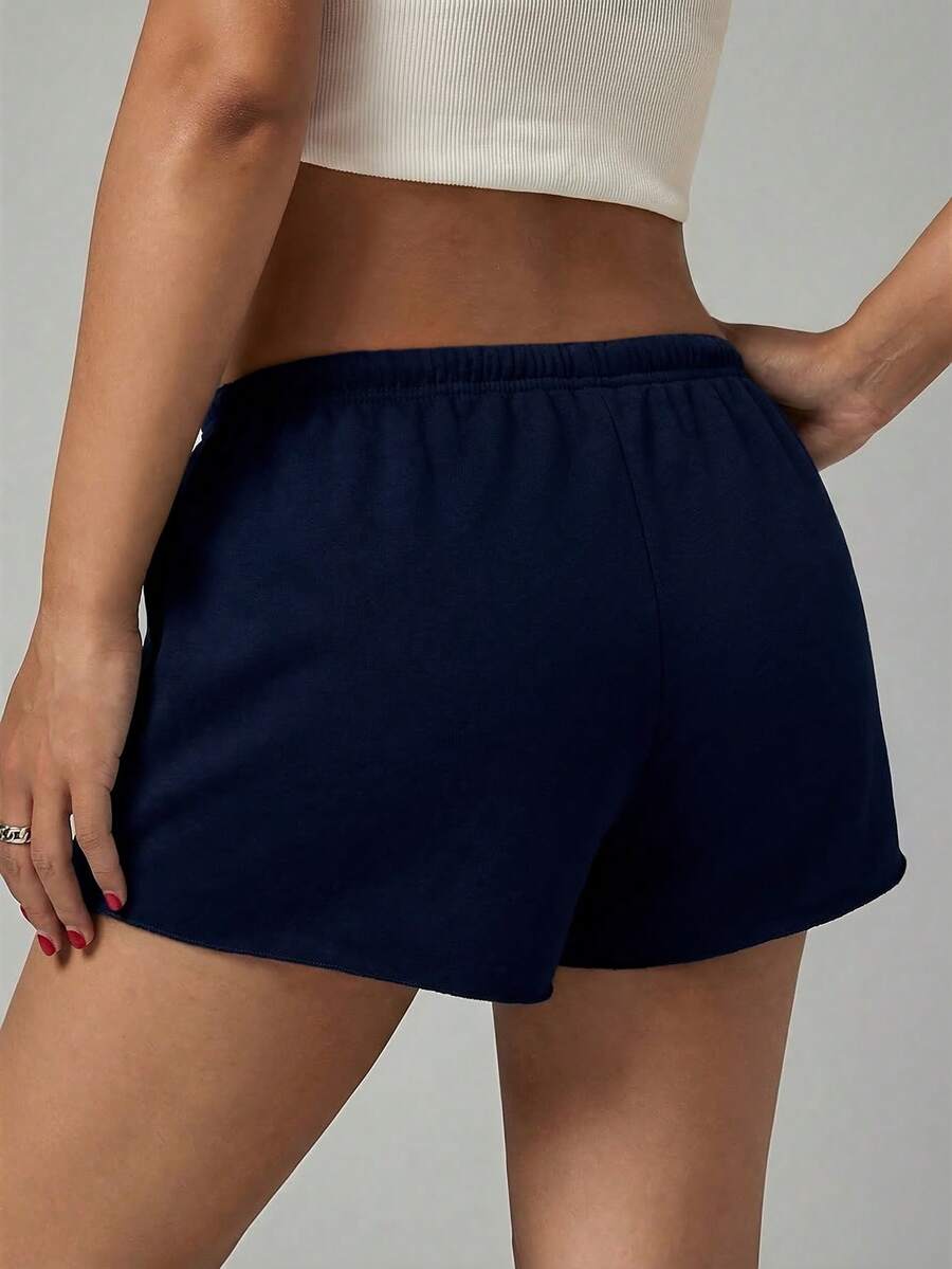 Petite women's burgundy casual track shorts with drawstring waist, raw hem, loose fit, and mini length
