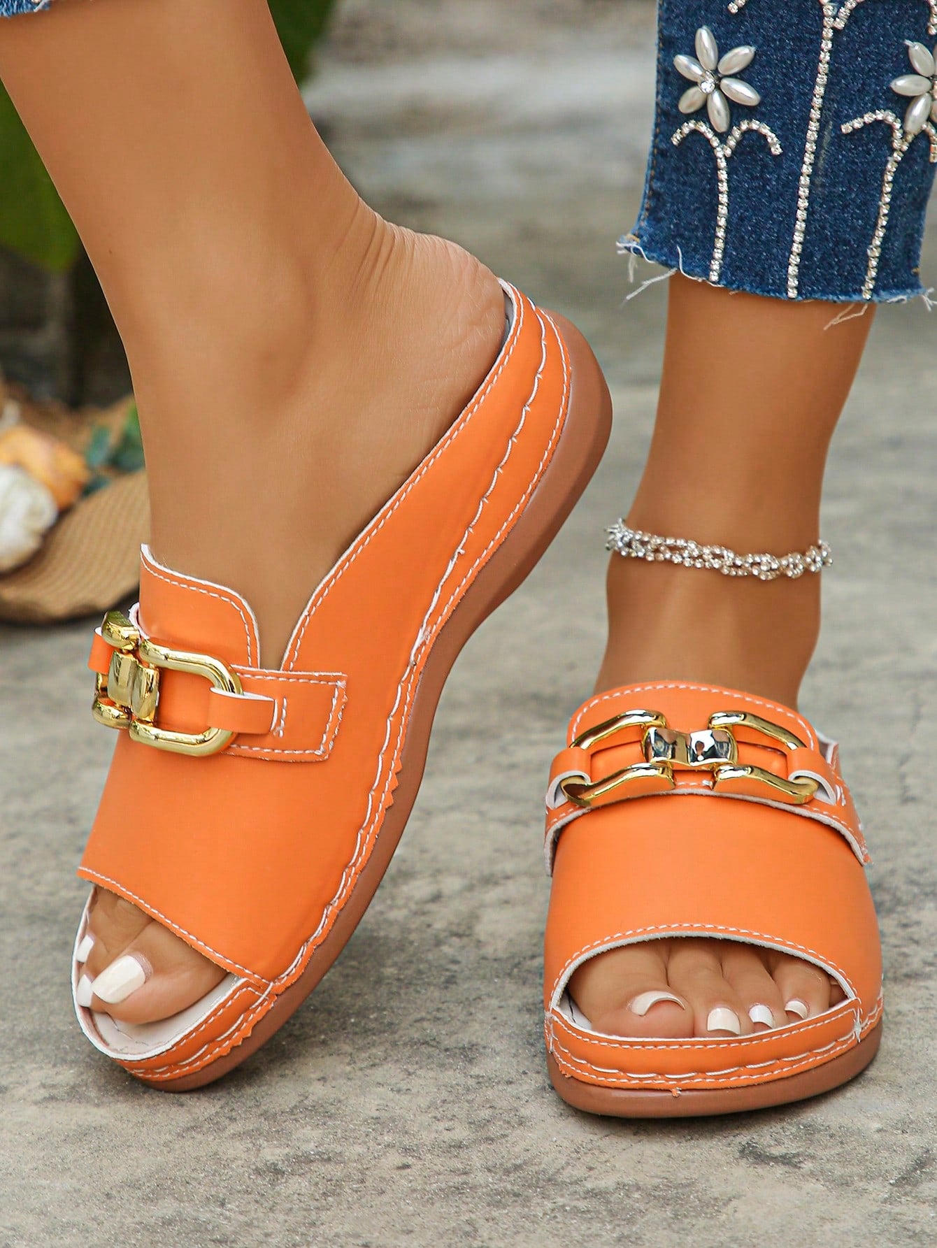 Women's bohemian wedge slide sandals with open toe, low wedge heel, slip-on design, and metal detail, available in plus sizes 36-43.