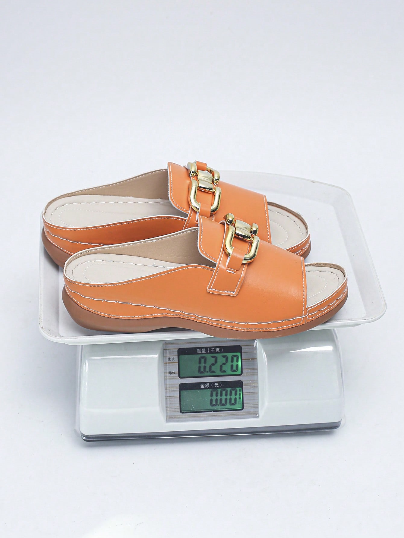 Women's bohemian wedge slide sandals with open toe, low wedge heel, slip-on design, and metal detail, available in plus sizes 36-43.