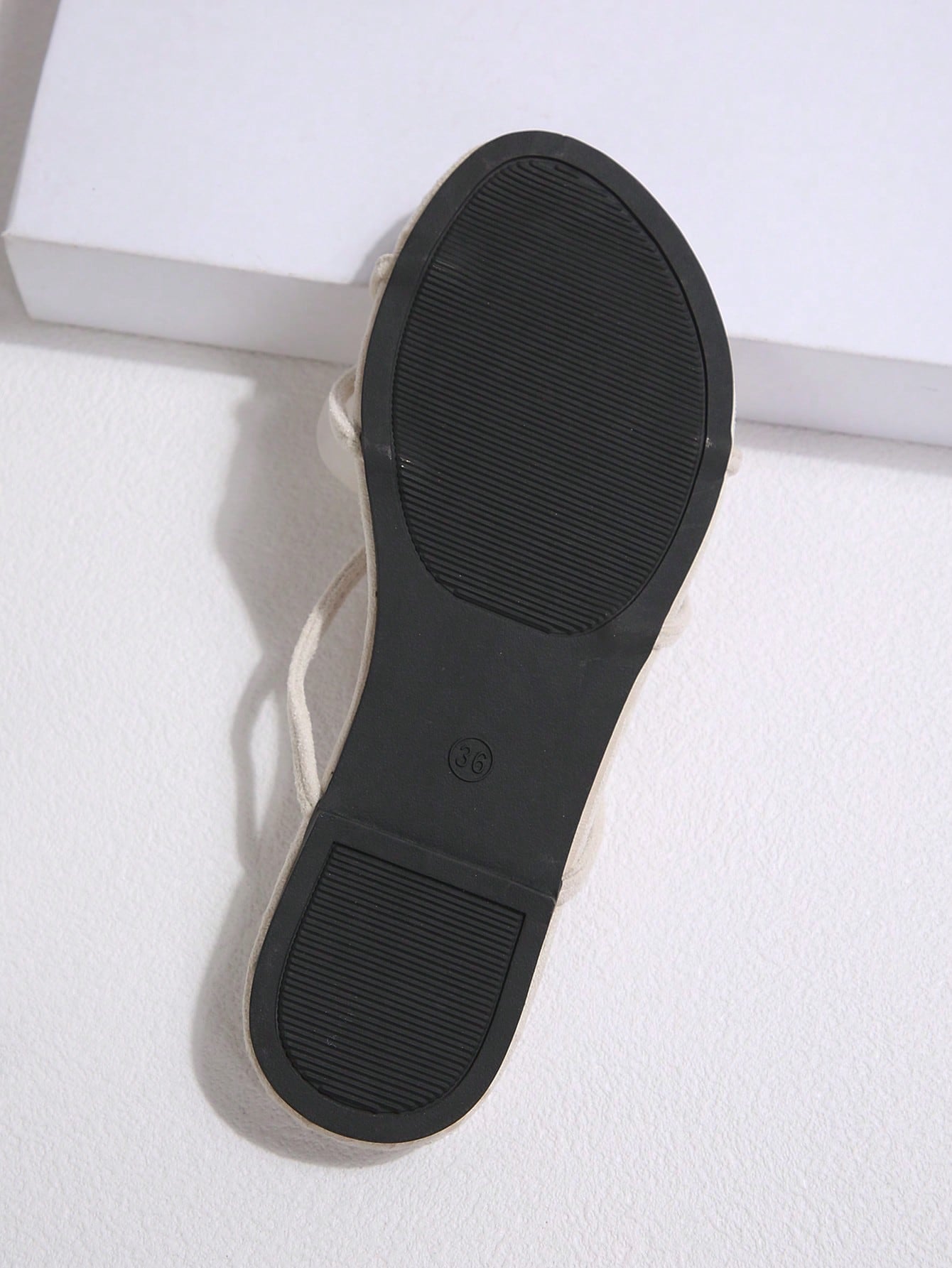 Women's open-toe flat slide sandals with a single strap and applique detail, glamorous casual style for beach and daily wear.