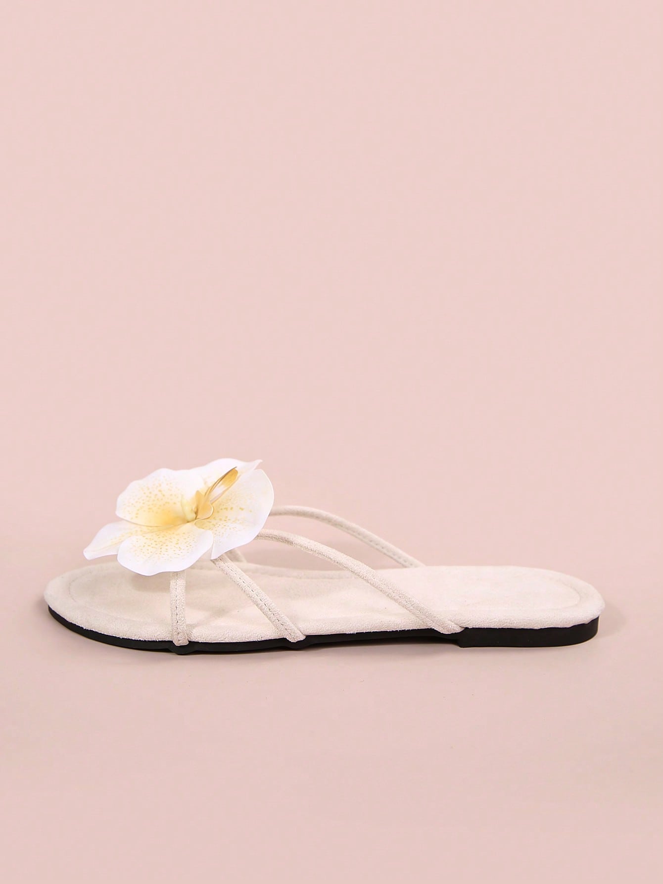 Women's open-toe flat slide sandals with a single strap and applique detail, glamorous casual style for beach and daily wear.