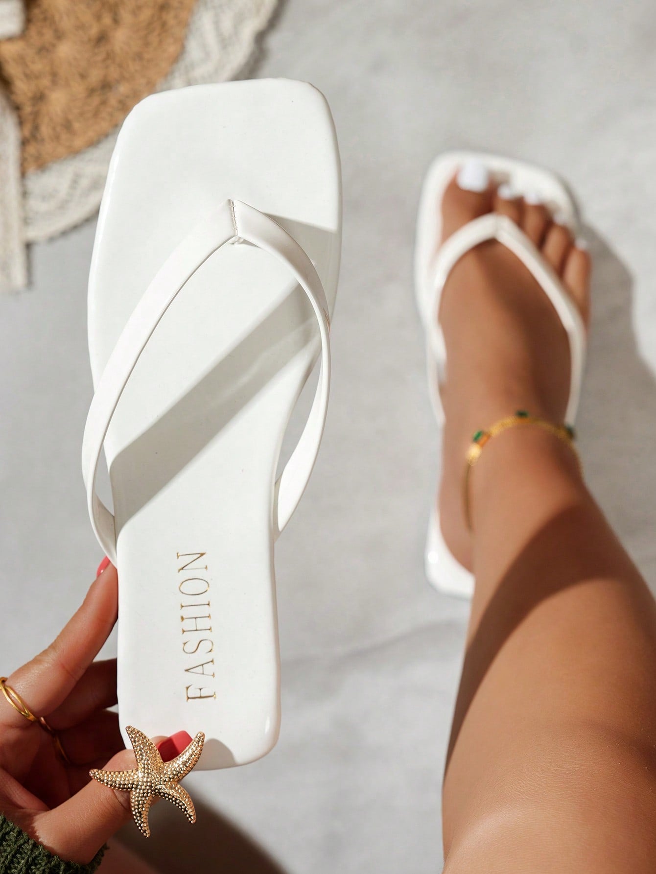 Women's square toe flip flop flat sandals featuring a toe-post design and criss cross strap detail, glossy fashion slides for beach, home, outing, and party wear.