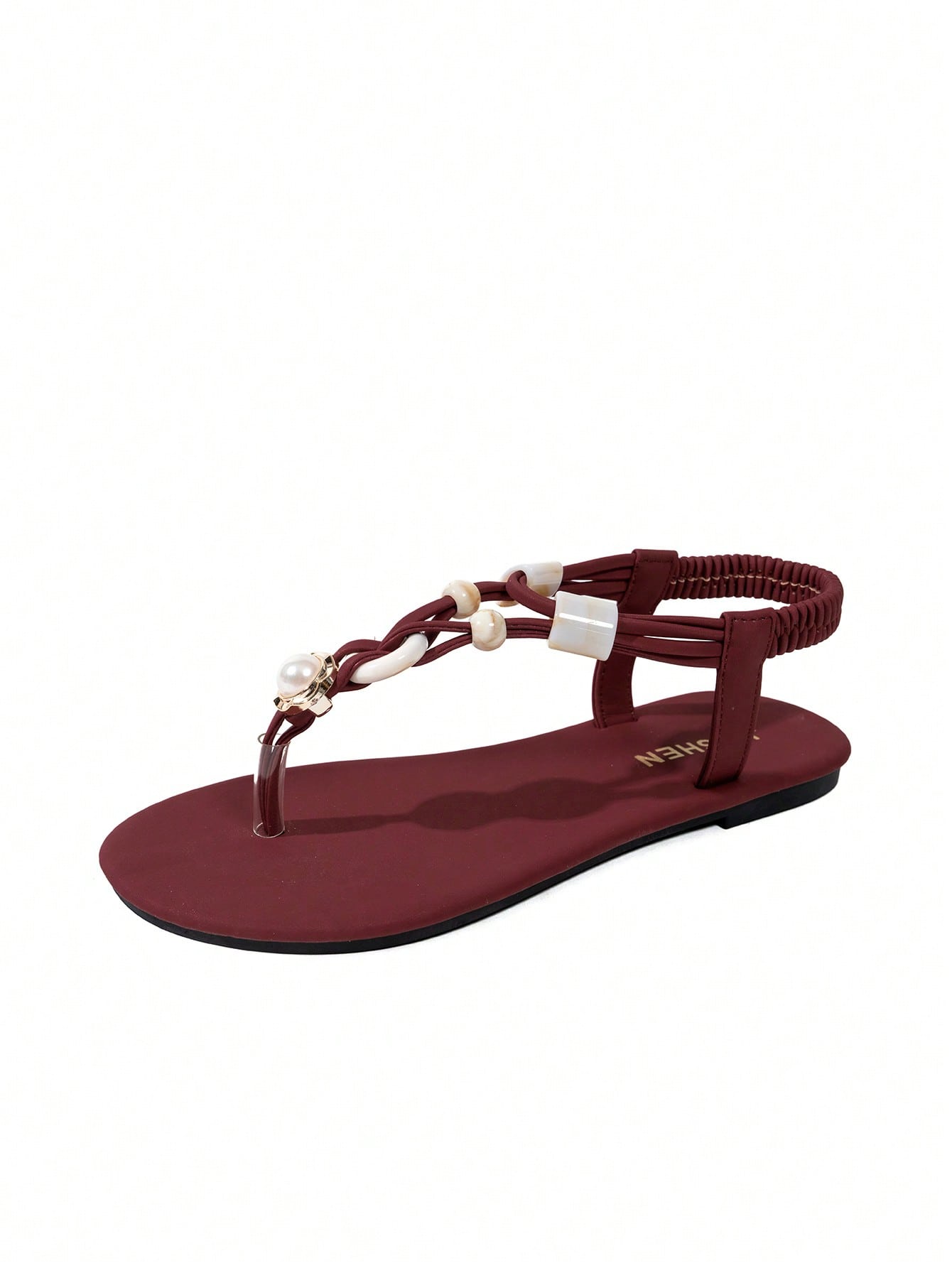 Women's beaded woven flip flop thong sandals with flat soft sole, toe-post design, and beach-style plant pattern detailing.