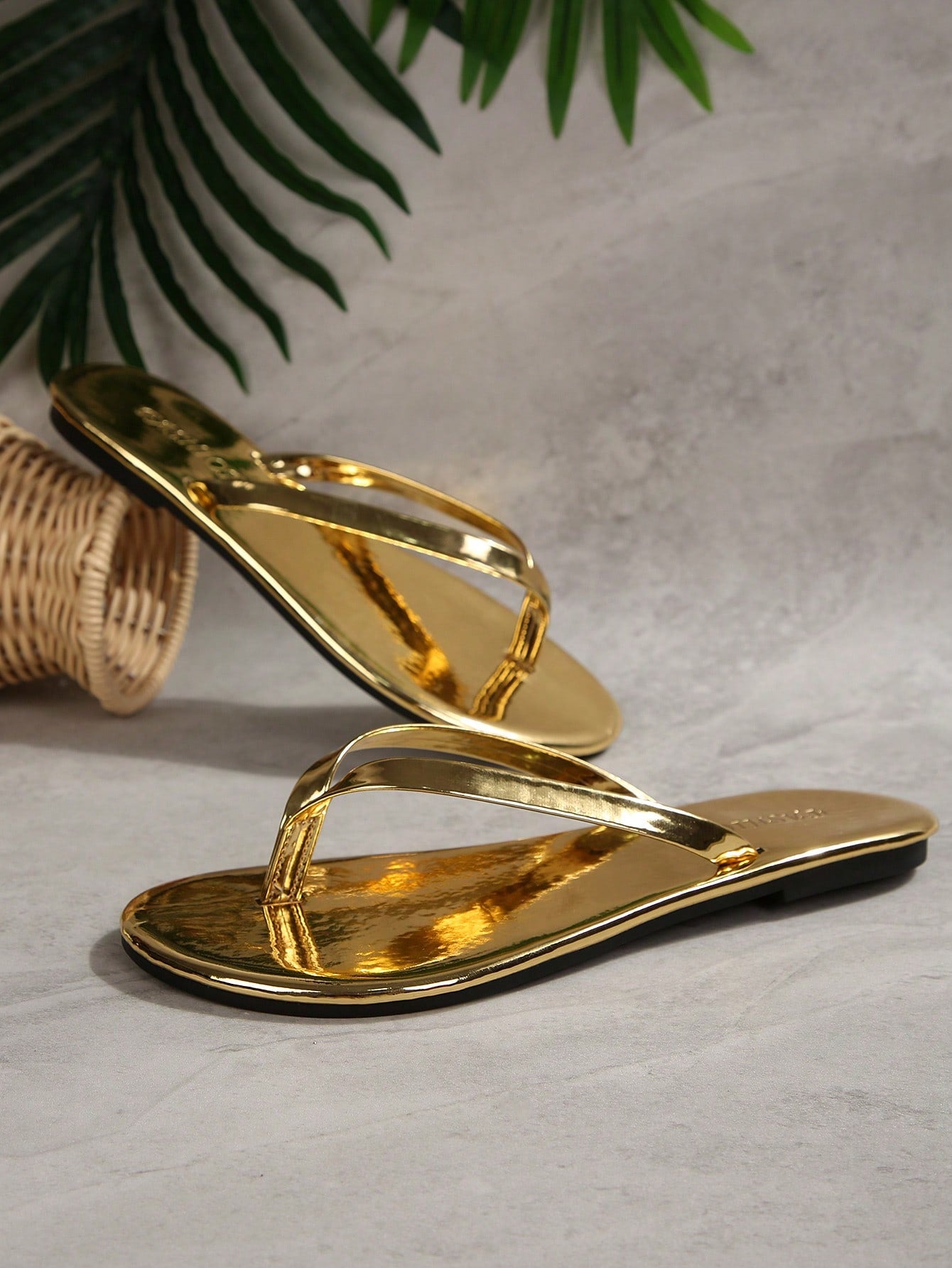 Women's chocolate brown flat flip flop sandals featuring a toe-post thong style and braided detail, suitable for casual indoor and outdoor wear.