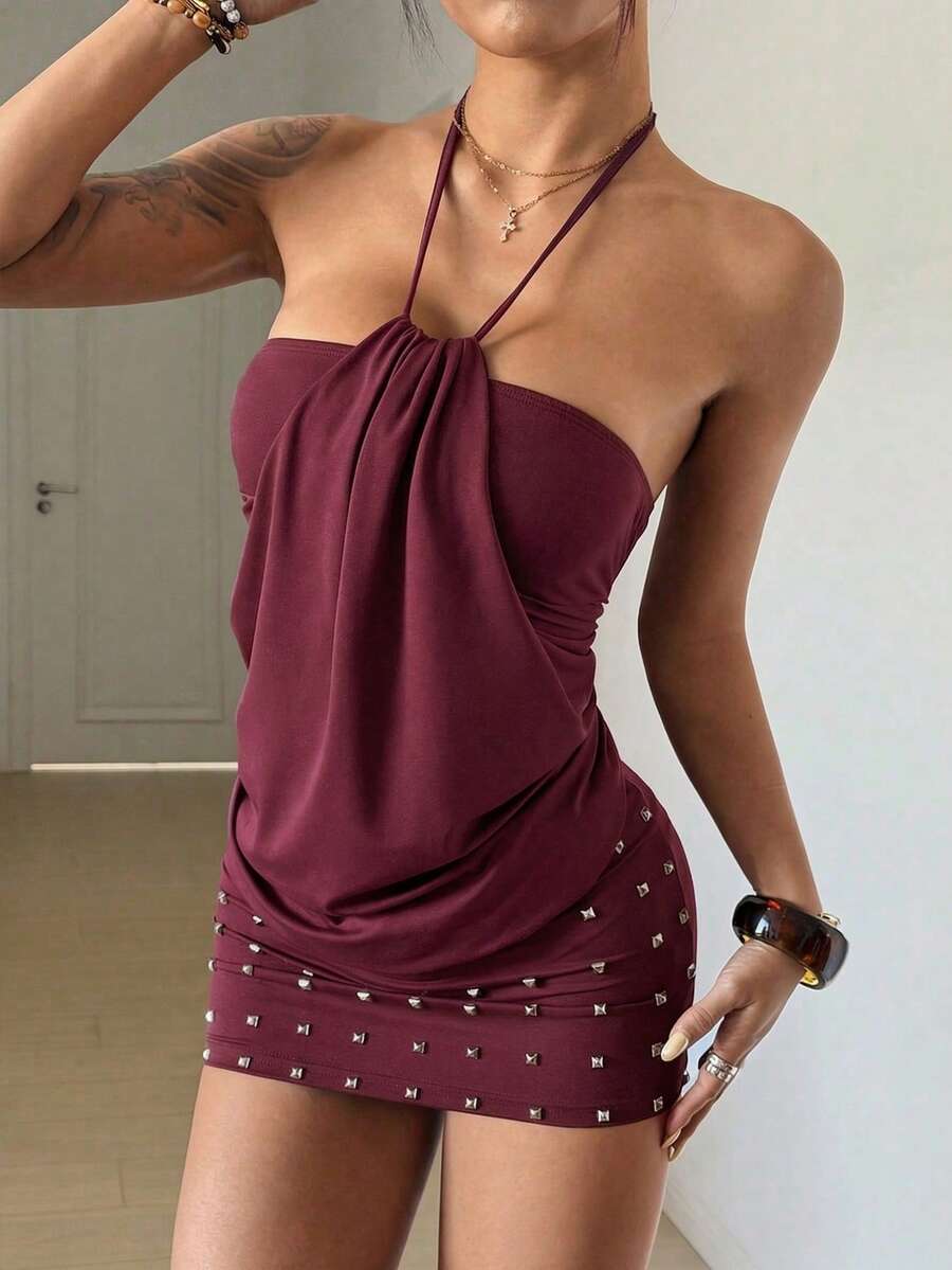 Women's brown beaded halter mini dress with a backless tie-back knot design, sleeveless slim fit silhouette, and pencil hem.