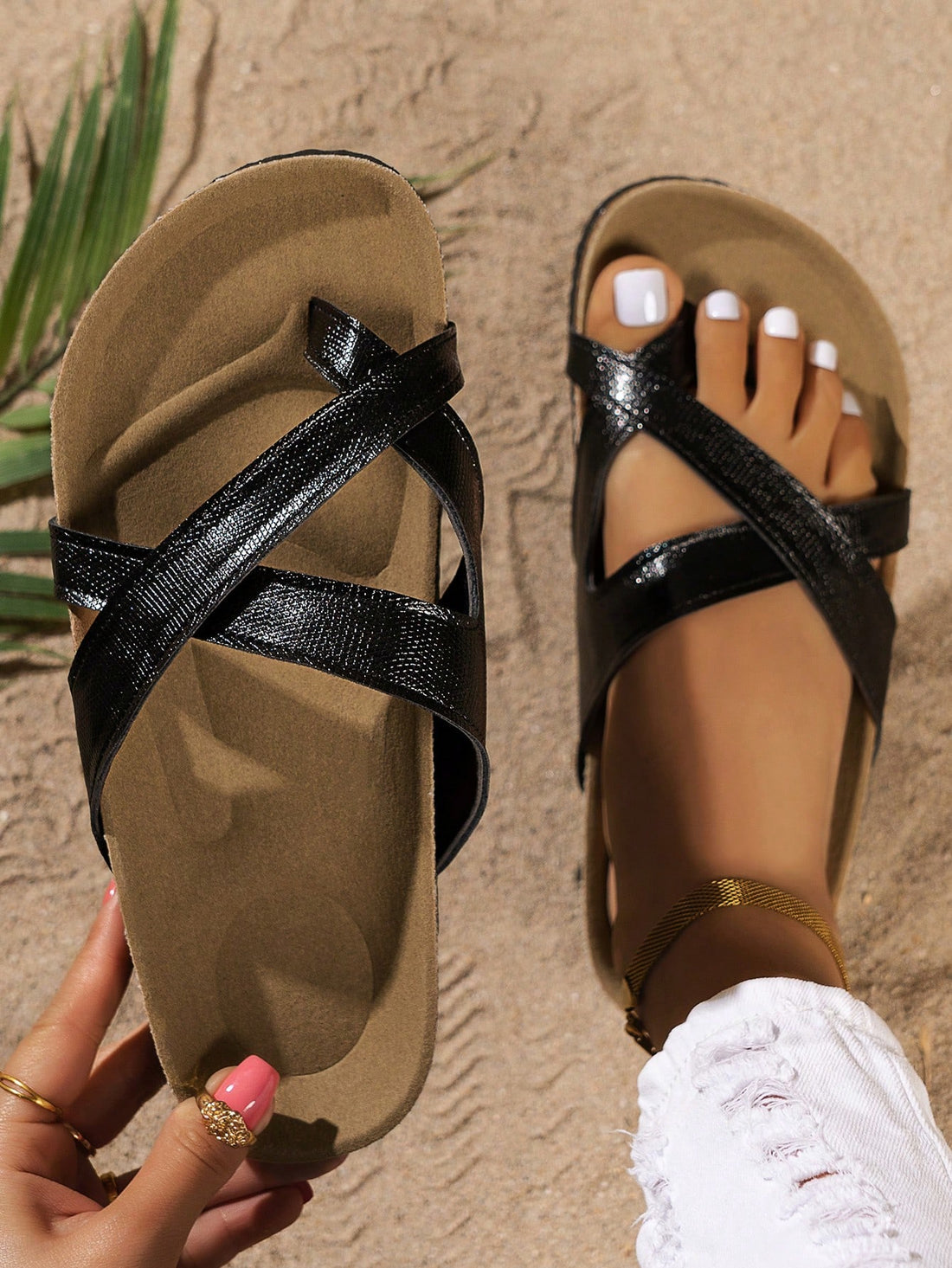 Women's criss-cross thong flat sandals with a footbed and flatform sole, suitable for vacation, beach, and casual outdoor wear.