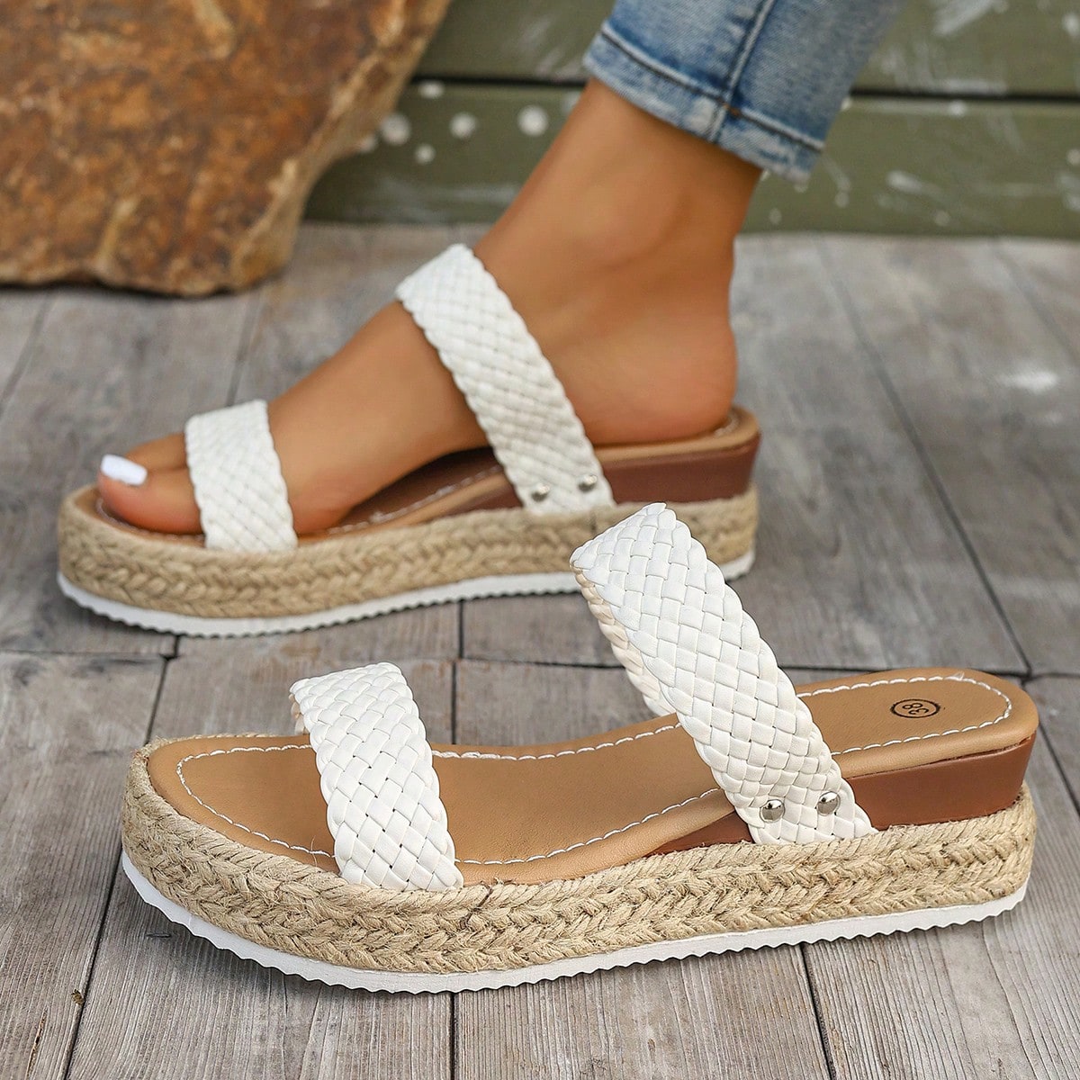 Women's thick sole flip flop sandals with adjustable buckle strap, toe post design, and flatform mid heel in a casual vacation style.