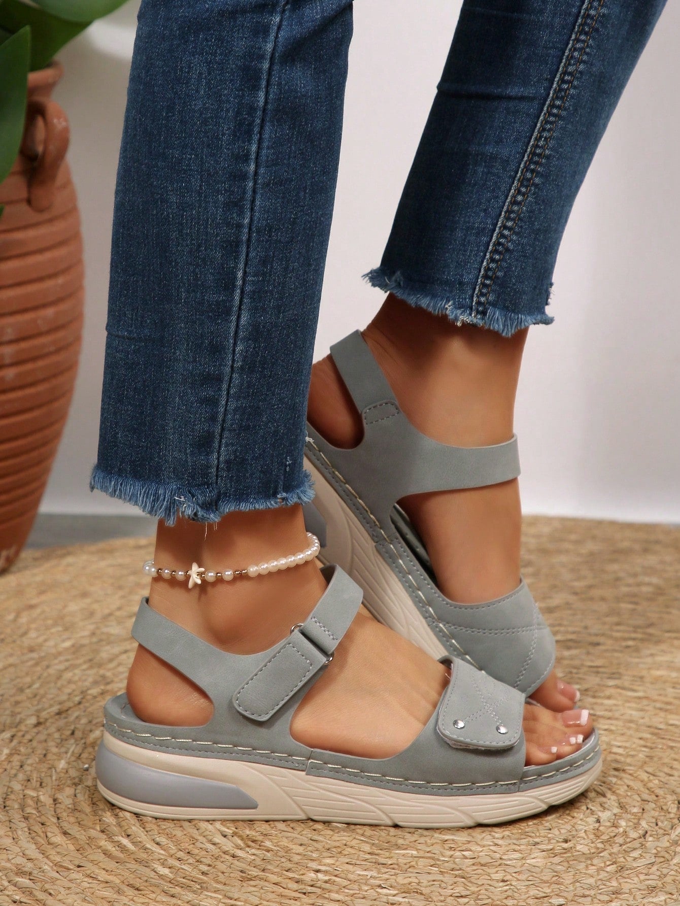 Women's plus size platform wedge sandals with hook-and-loop closure, open toe, ankle strap, and cut-out detailing in a casual beach style.