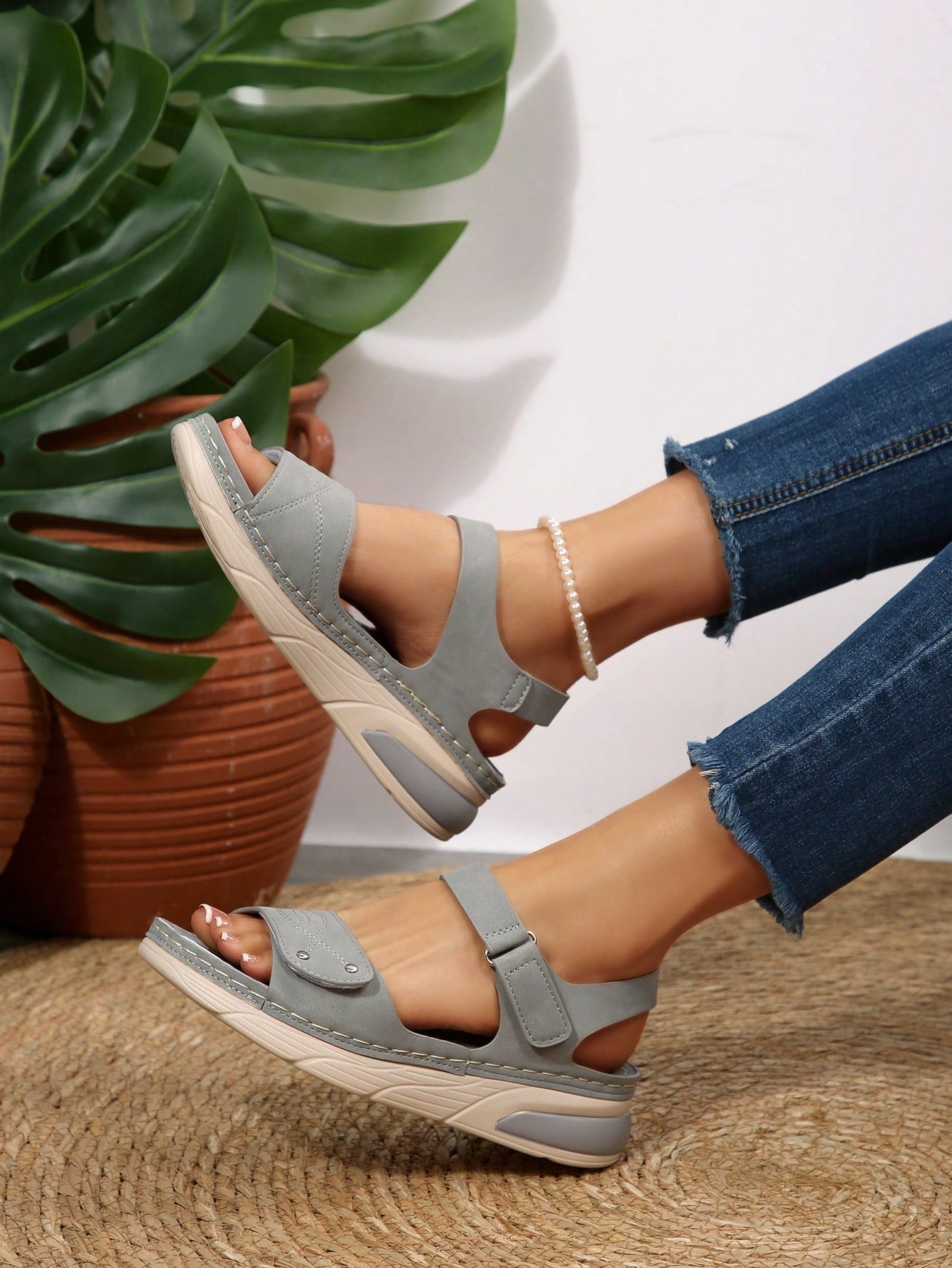 Women's plus size platform wedge sandals with hook-and-loop closure, open toe, ankle strap, and cut-out detailing in a casual beach style.