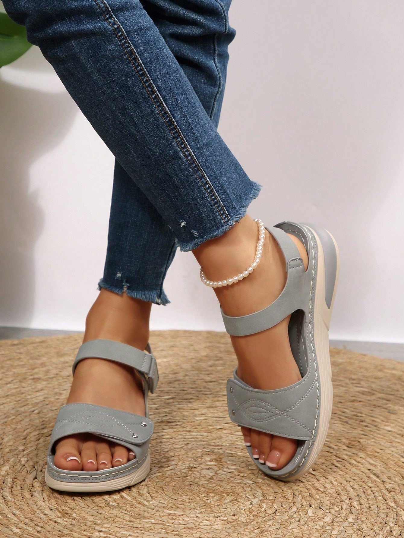 Women's plus size platform wedge sandals with hook-and-loop closure, open toe, ankle strap, and cut-out detailing in a casual beach style.