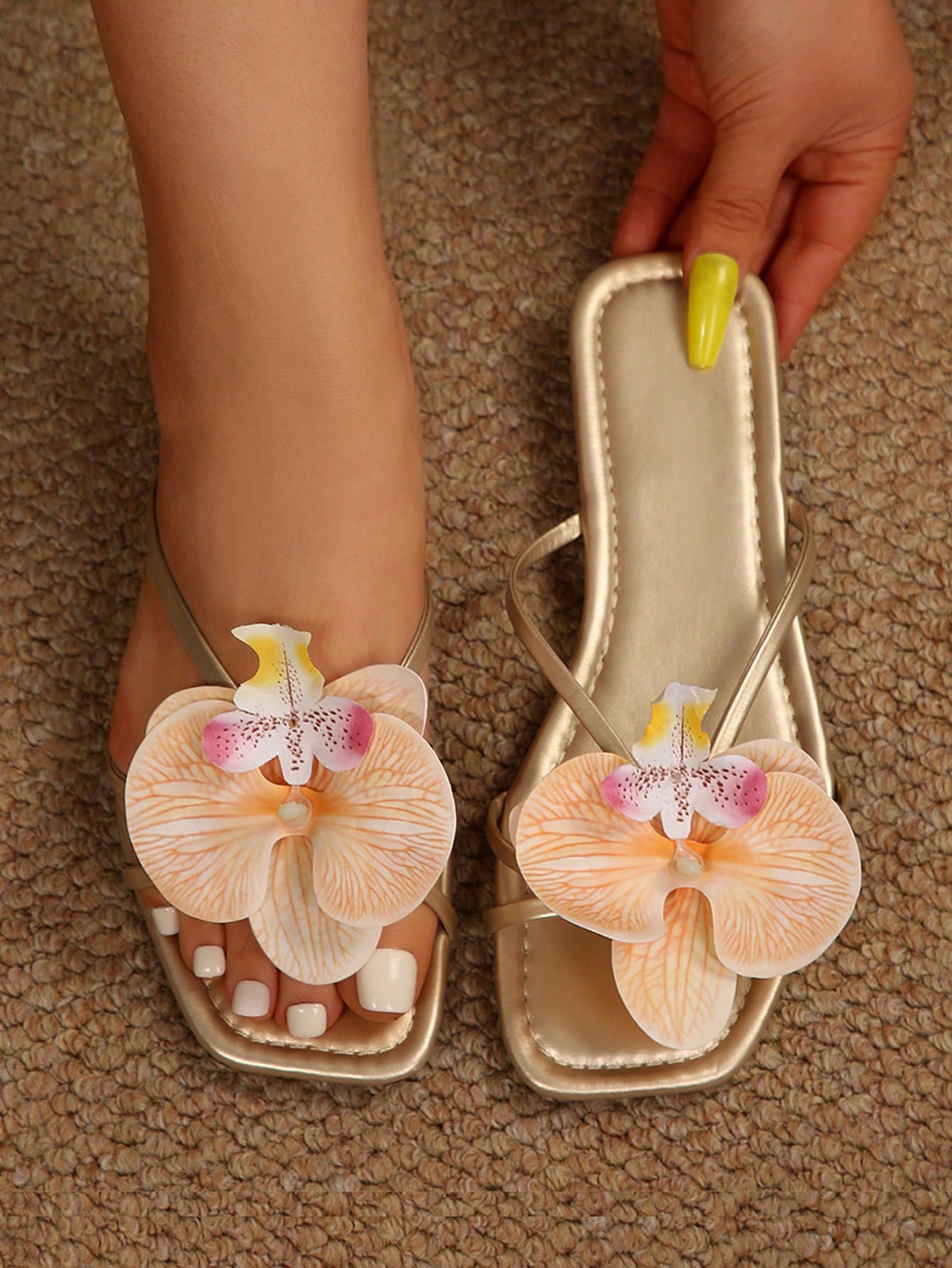 Wide fit women's beige flat thong sandals with butterfly orchid appliqué decor and open toe, suitable for beach, vacation, home, and casual everyday wear.