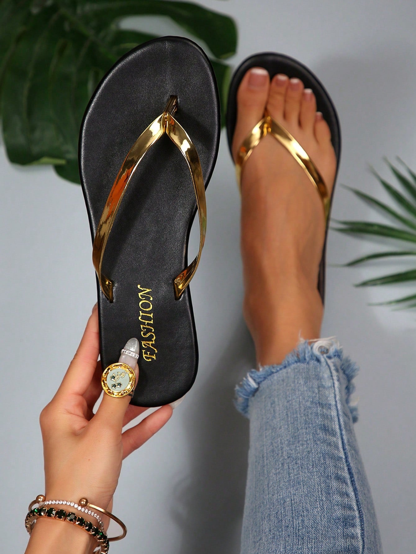 Women's chocolate brown flat flip flop sandals featuring a toe-post thong style and braided detail, suitable for casual indoor and outdoor wear.