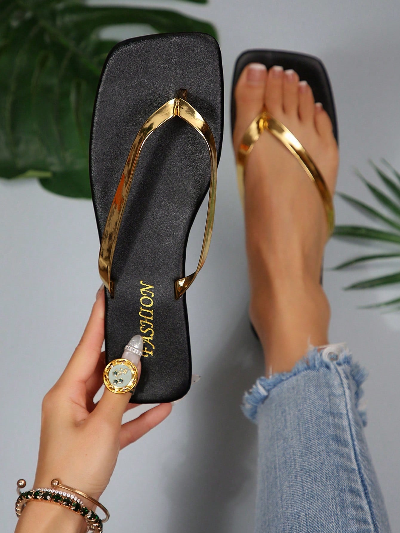 Women's chocolate brown flat flip flop sandals featuring a toe-post thong style and braided detail, suitable for casual indoor and outdoor wear.