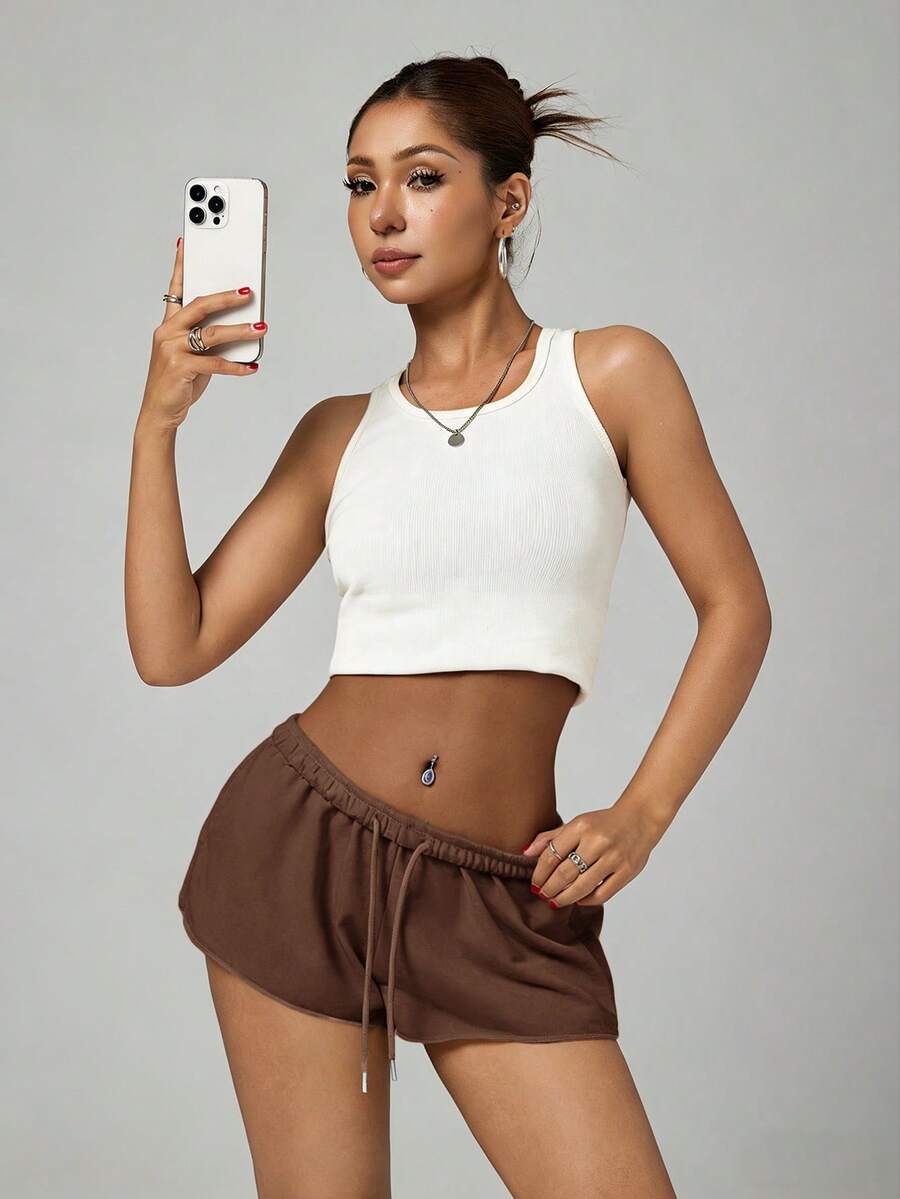 Petite women's burgundy casual track shorts with drawstring waist, raw hem, loose fit, and mini length