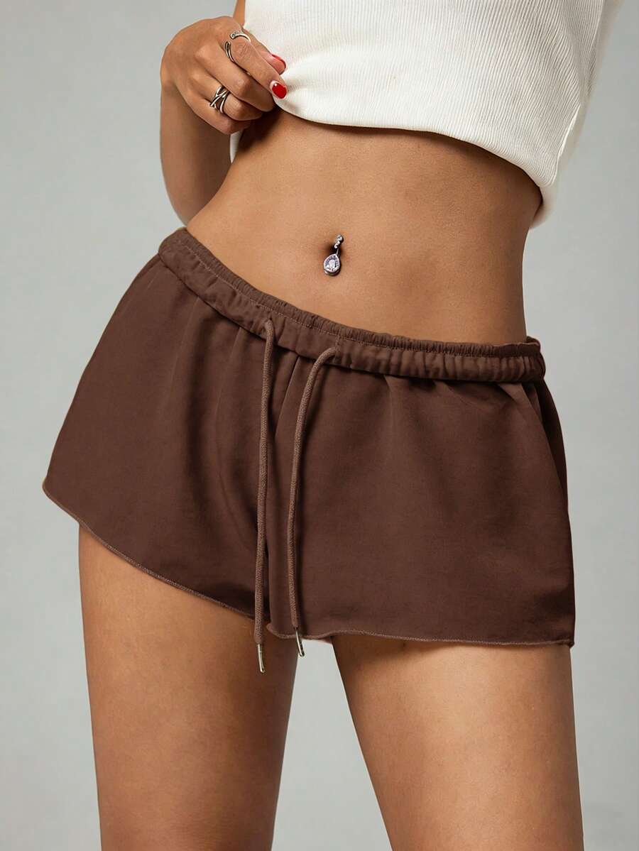 Petite women's burgundy casual track shorts with drawstring waist, raw hem, loose fit, and mini length