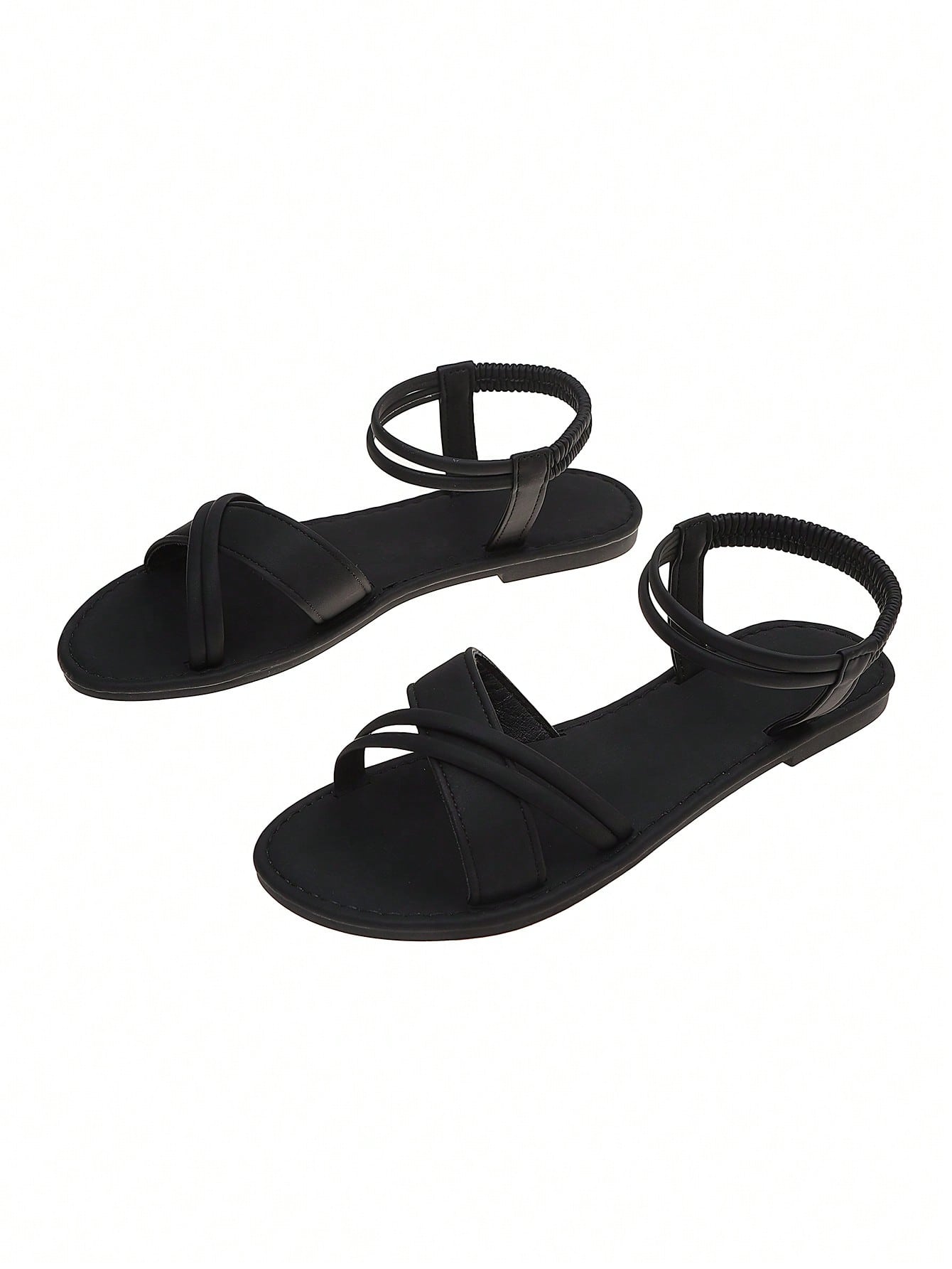 Women's flat open-toe slingback sandals with braided woven elastic band and soft sole, suitable for beach and casual wear.