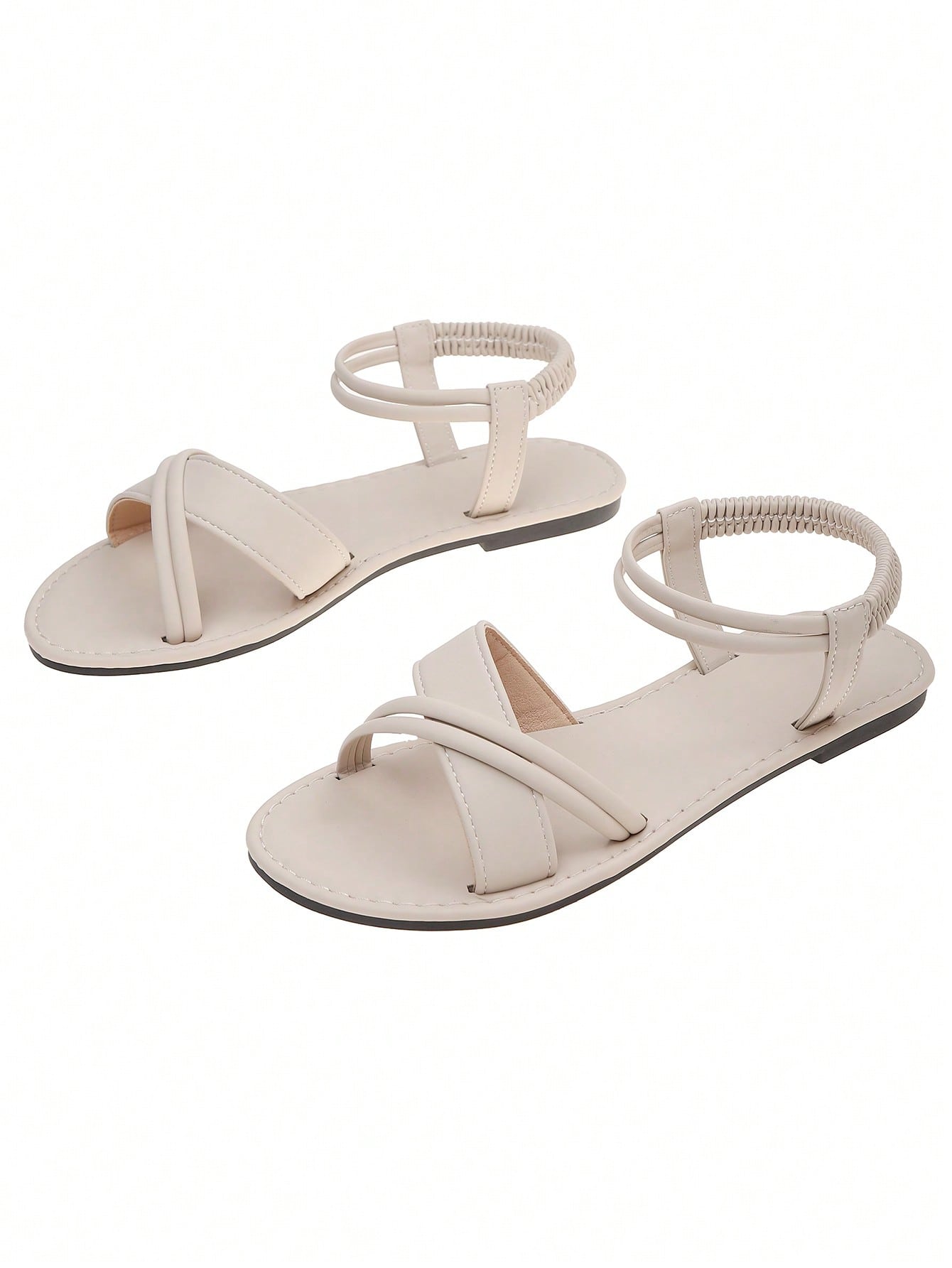 Women's flat open-toe slingback sandals with braided woven elastic band and soft sole, suitable for beach and casual wear.