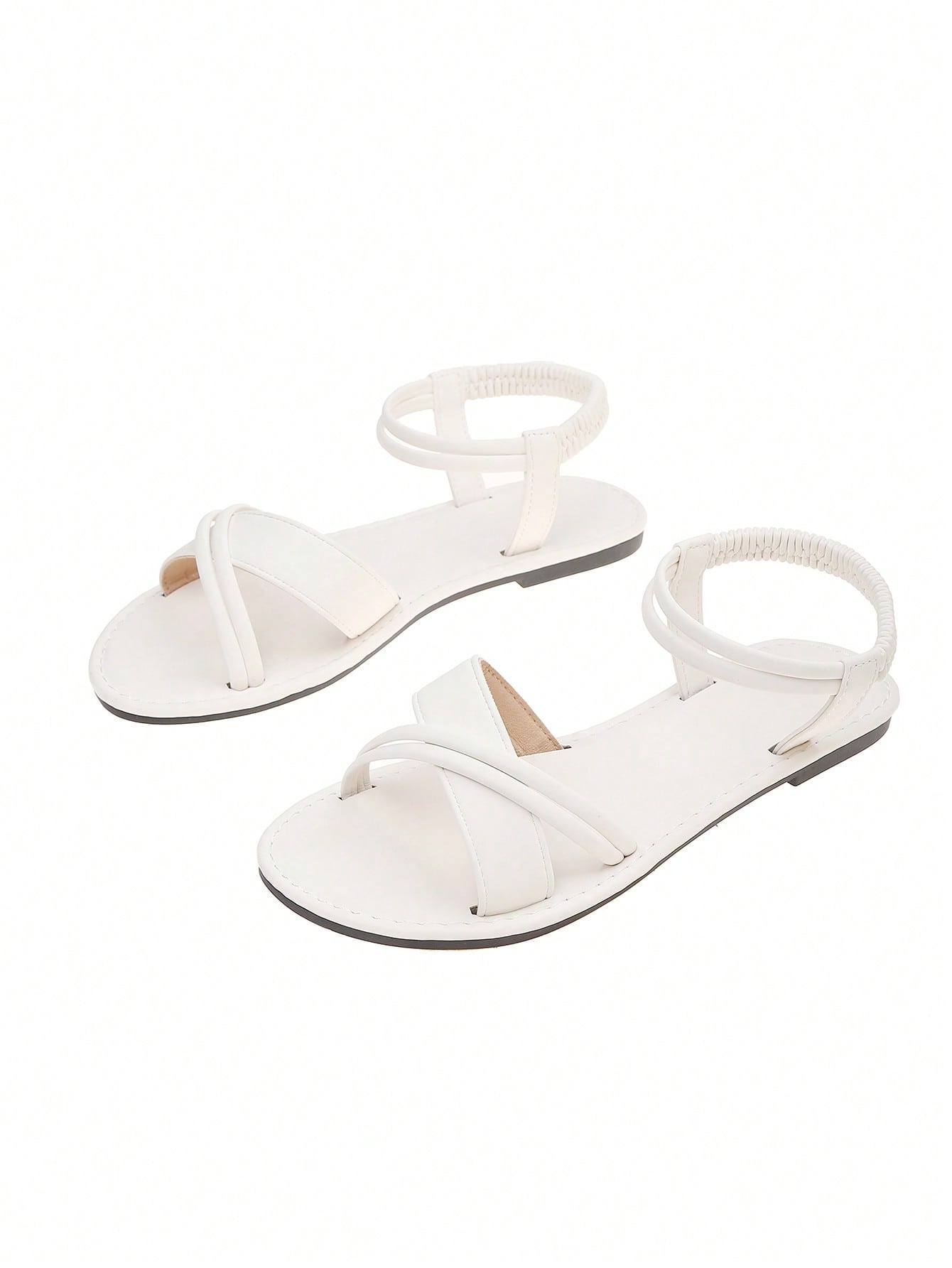 Women's flat open-toe slingback sandals with braided woven elastic band and soft sole, suitable for beach and casual wear.