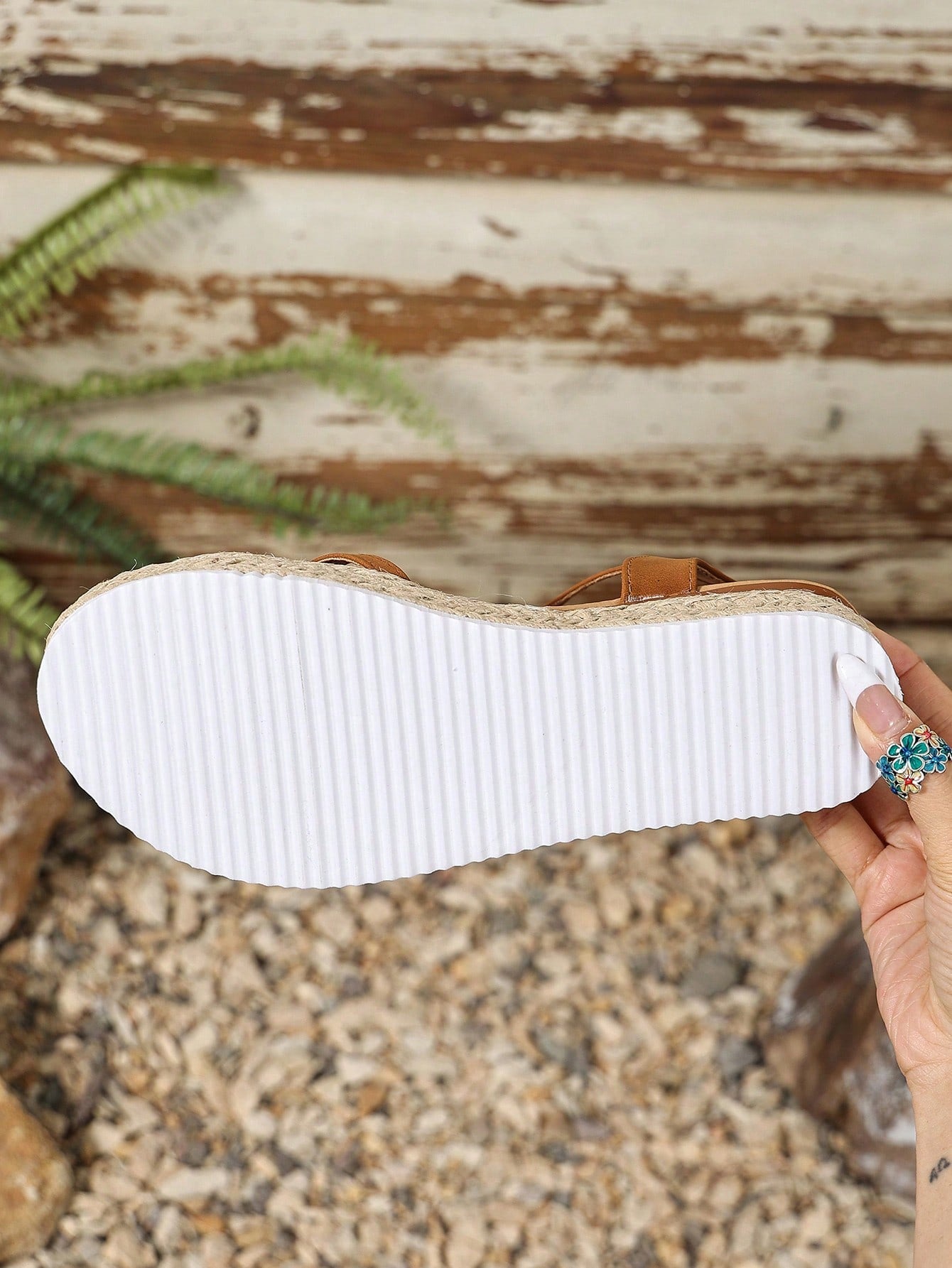 Women's thick sole flip flop sandals with adjustable buckle strap, toe post design, and flatform mid heel in a casual vacation style.