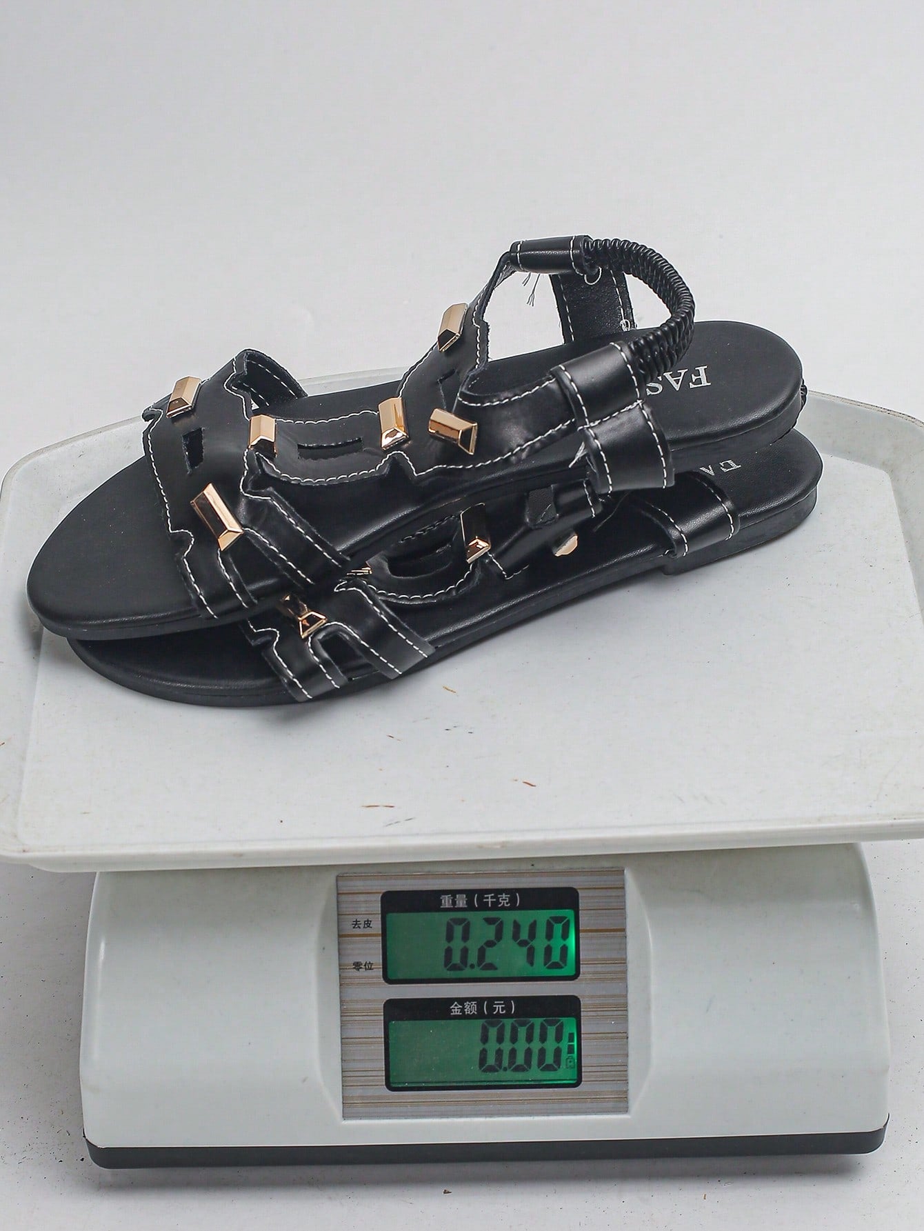 Women’s plus size 35-45 flat thong sandals with elastic strap, round toe shape, textured pattern, and rhinestone asymmetrical detail in slip-on beach style for outdoor summer wear.