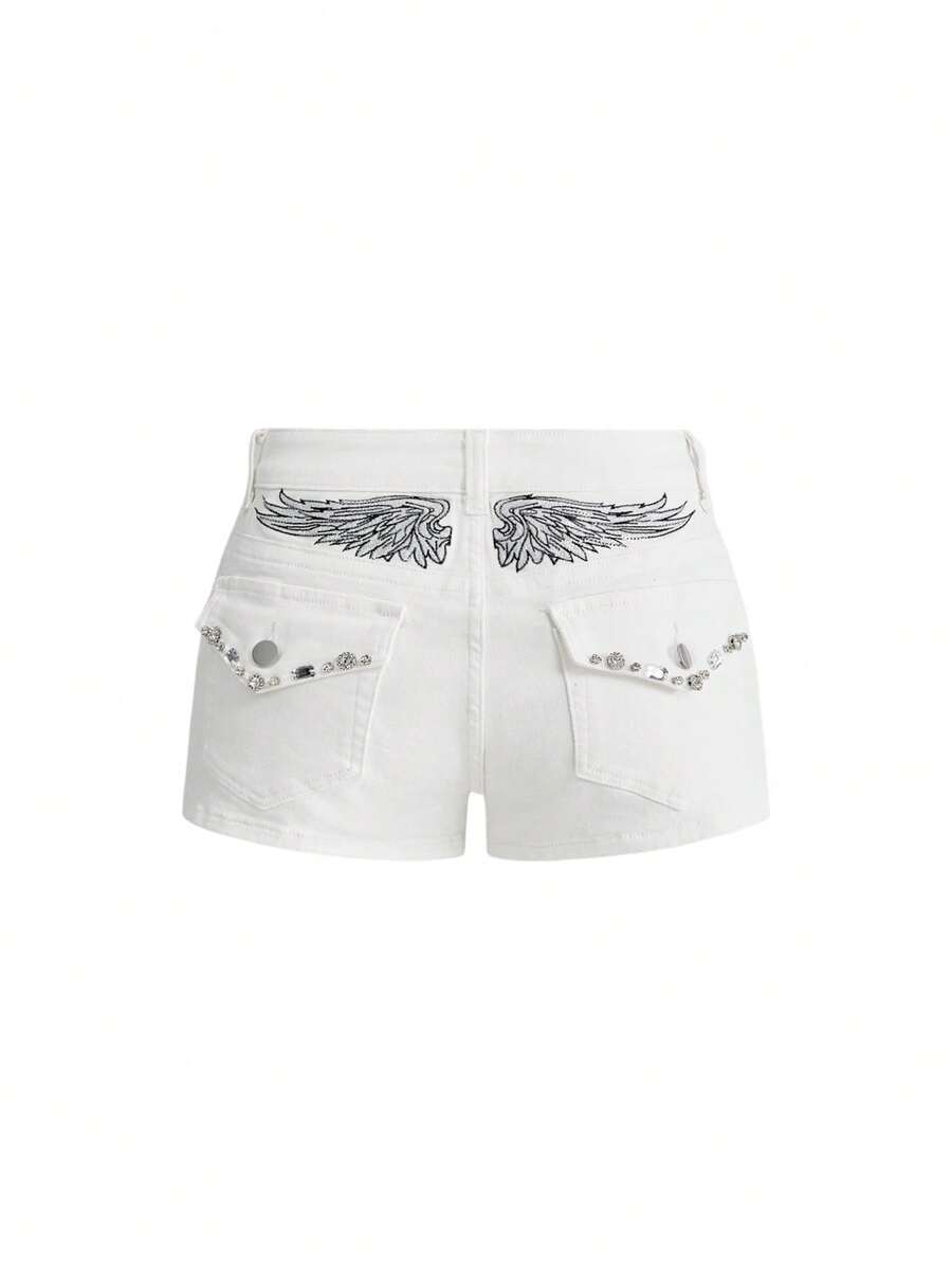 Blue ultra low waist mini shorts with ripped details, zipper fly, button closure, back wing embroidery, and rhinestone decor in a Y2K grunge punk style.