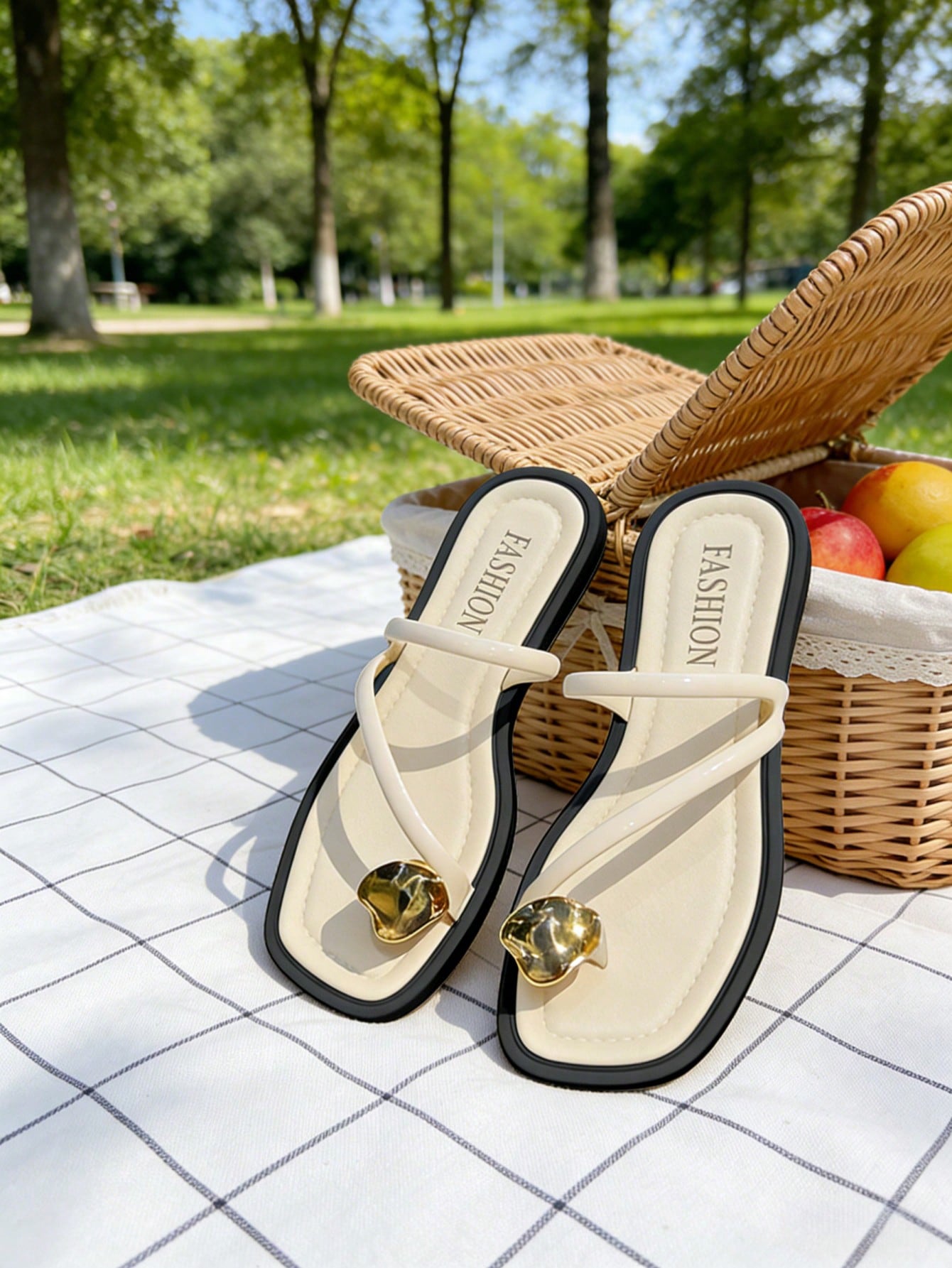 Women's flat toe-post sandals with cross-over straps and buckle detail, elegant outdoor style
